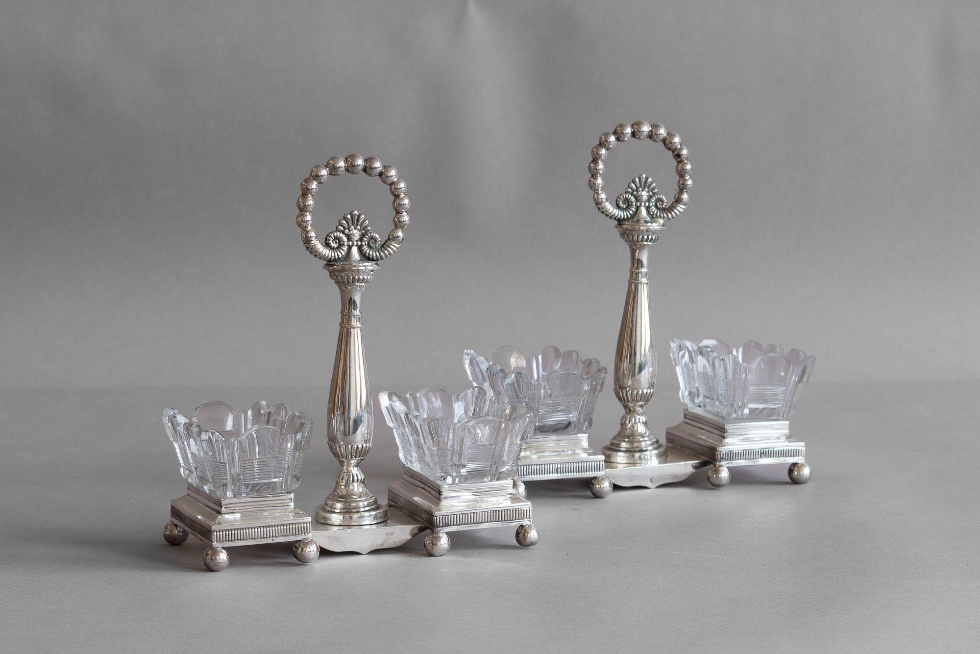 Pair of French glass open salts in silver plated stands.
Circa 1890.
H 17cm x W 15cm x D 7.5cm
Please be in touch for an accurate shipping quote.