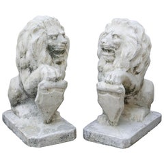 Pair of Opposing Cast Stone Lion Garden Ornaments
