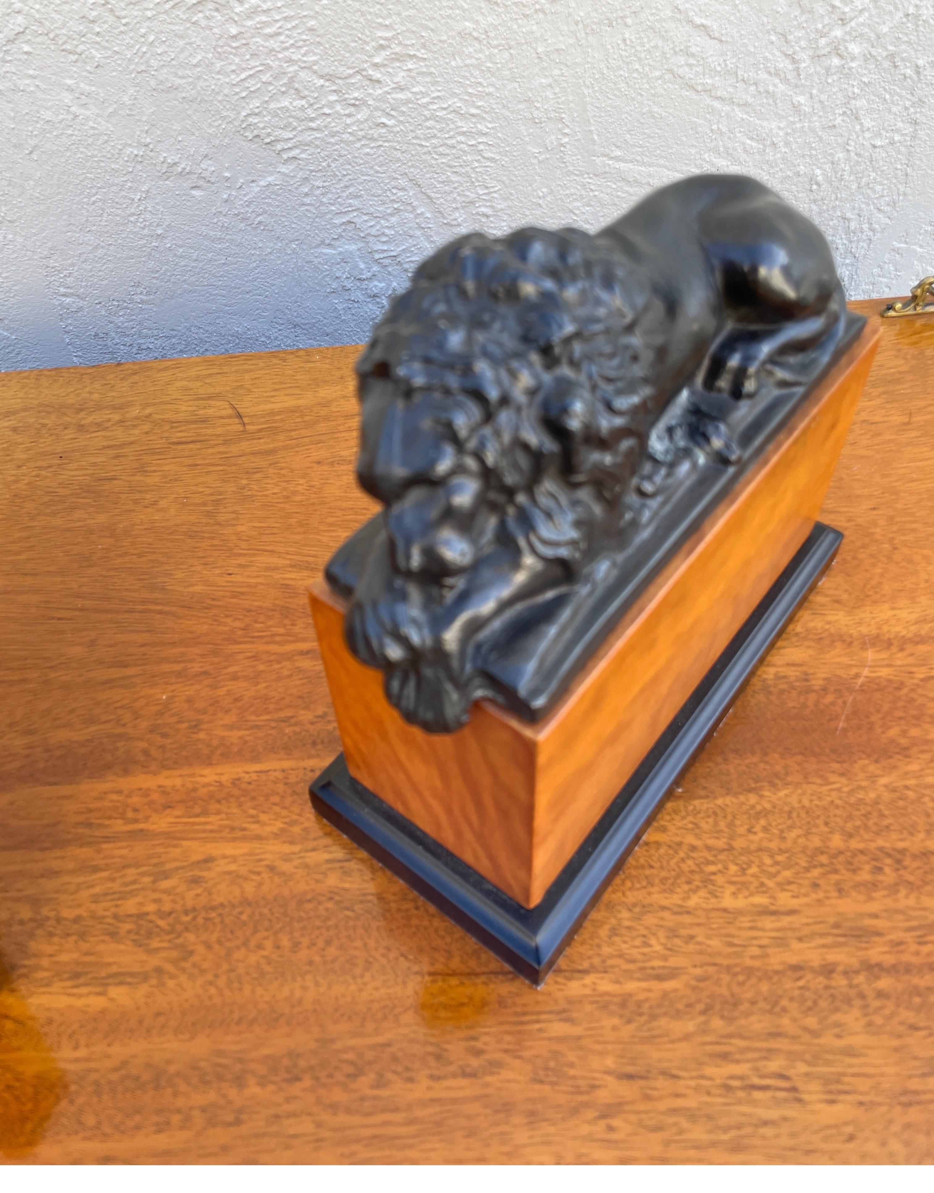 Pair of Opposing Lion Bookends In Good Condition For Sale In West Palm Beach, FL