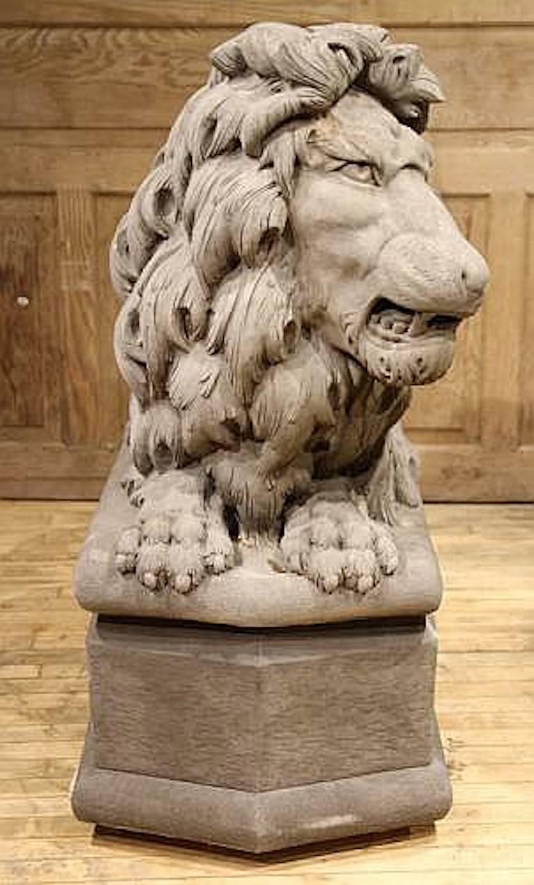 A pair of opposing stone lions having highly detailed manes and regal posture.
Dimensions: Height 33