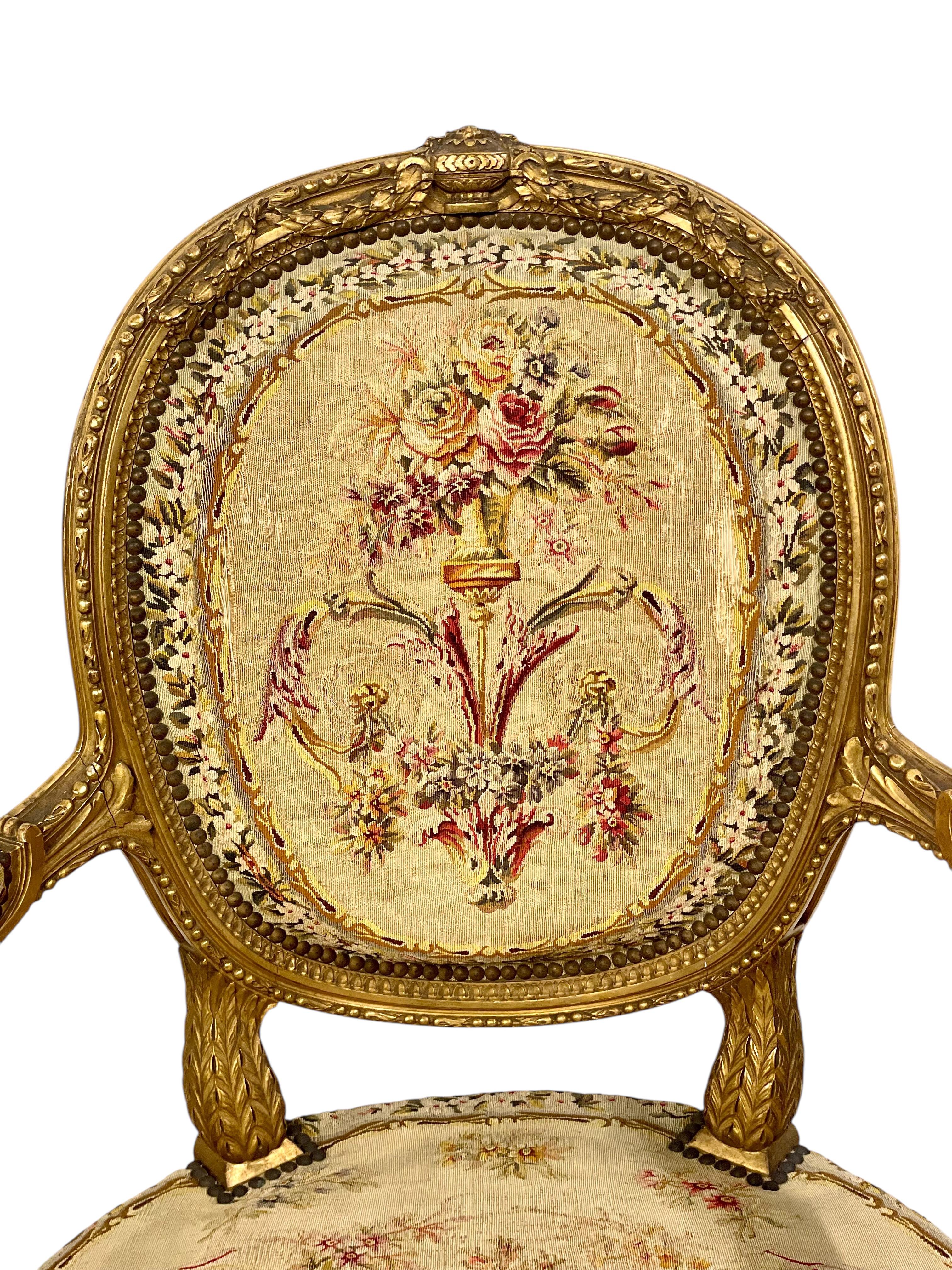 Pareja de opulentos Fauteuils de madera dorada Siglo XIX Tapiz en venta