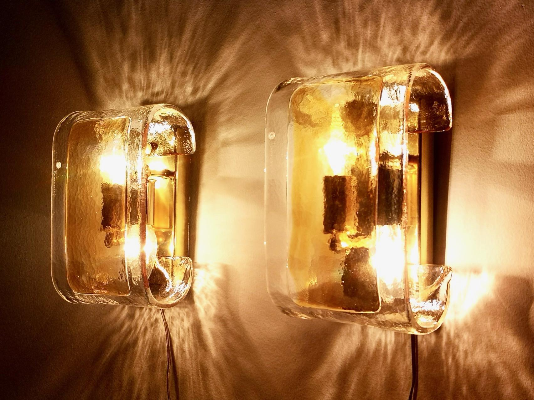 They are made in Murano glass and brass and marked La Murrina.
These wall lights are in excellent original condition, even if they're vintage, and they are ready to give ambiance to any room. 

Measures: Width 16 cm
Depth 12 cm
Height 25 cm.