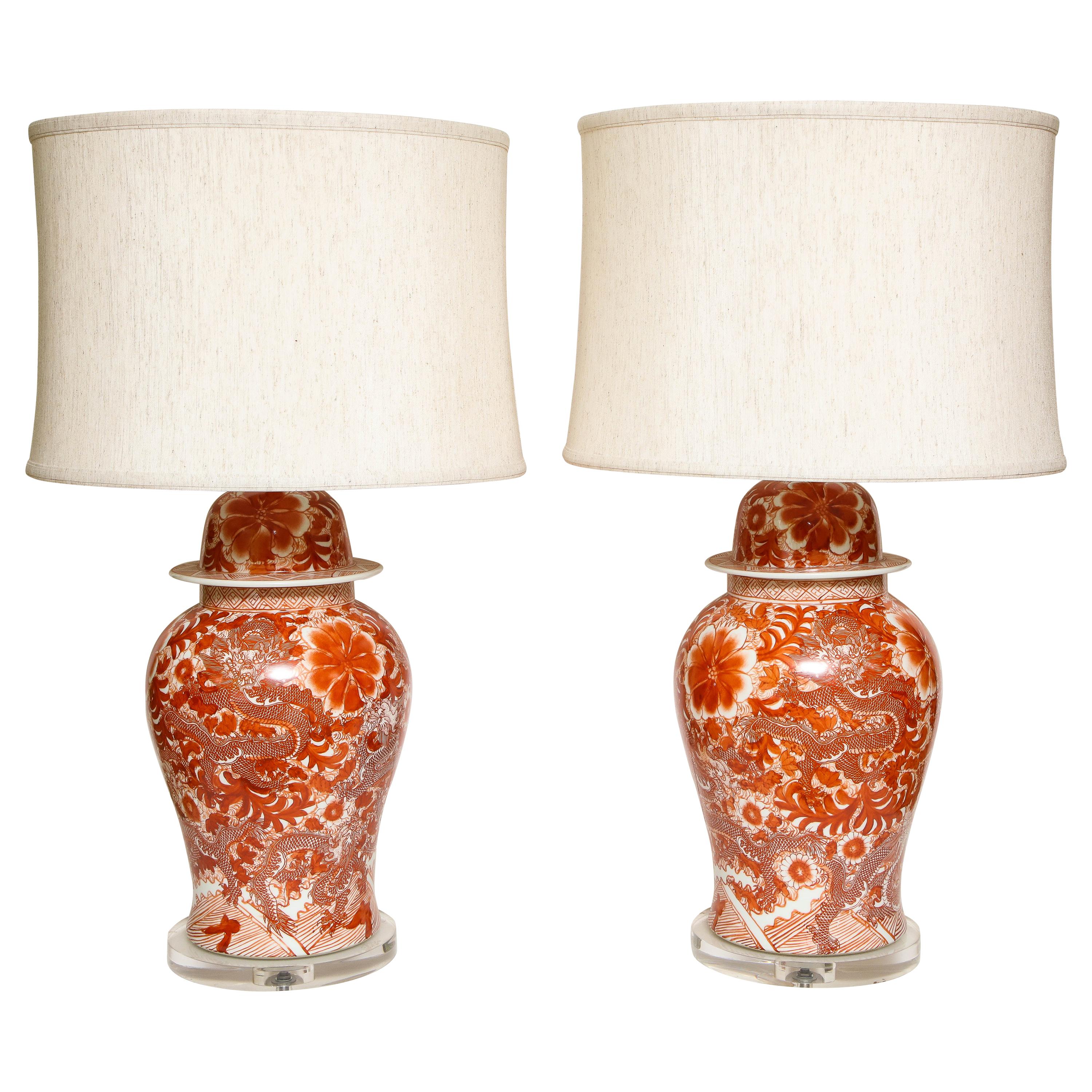 Pair of Orange and White Ceramic Lamps