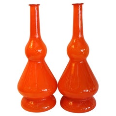 Pair of Orange Cased Glass Decanters