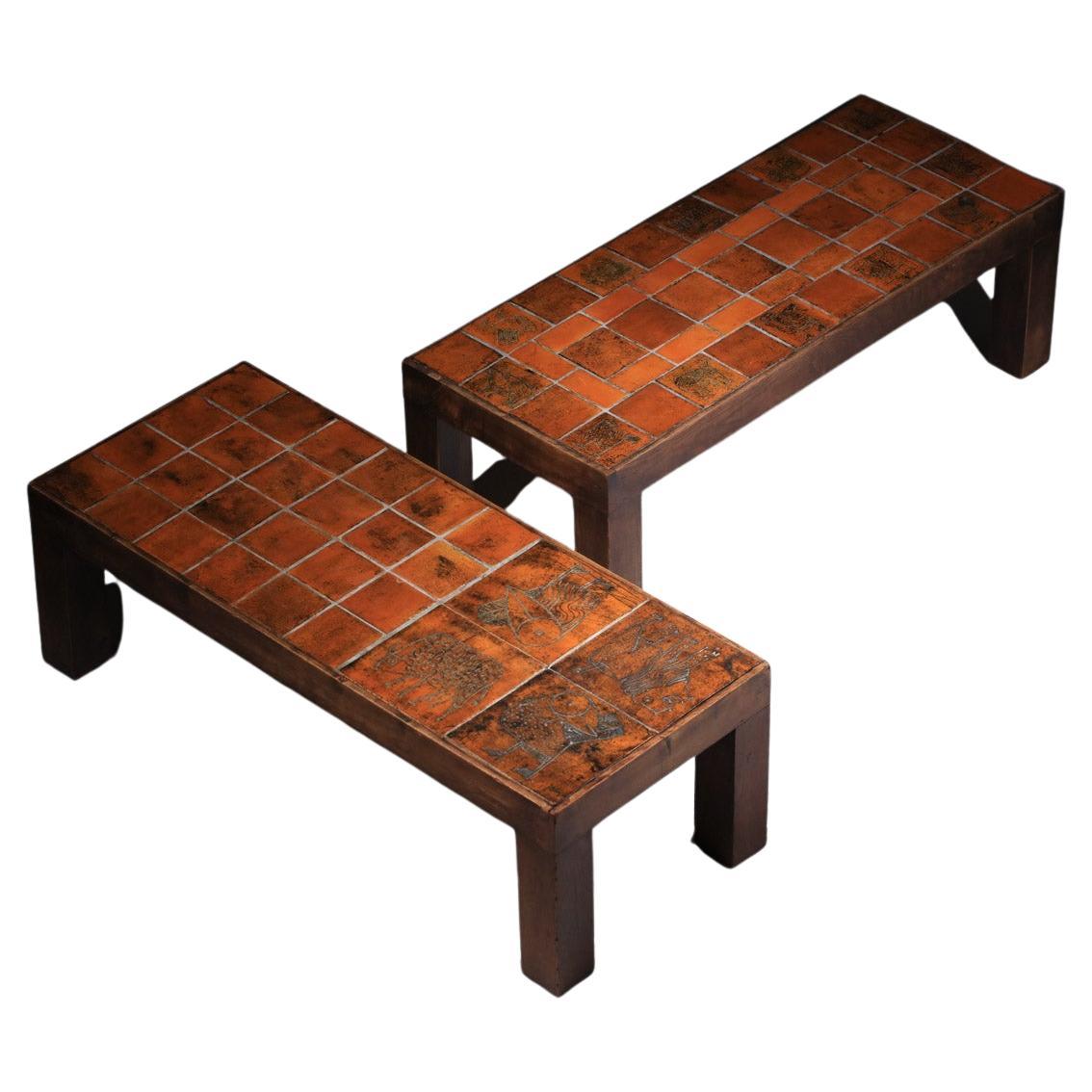 Pair of orange ceramic coffee tables by Jacques Blin