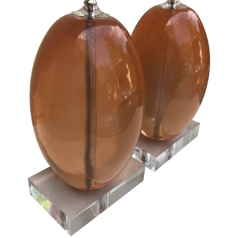 Pair Of Orange Ellipse-Shaped Resin Table Lamps On Thick Lucite Base For Sale 2