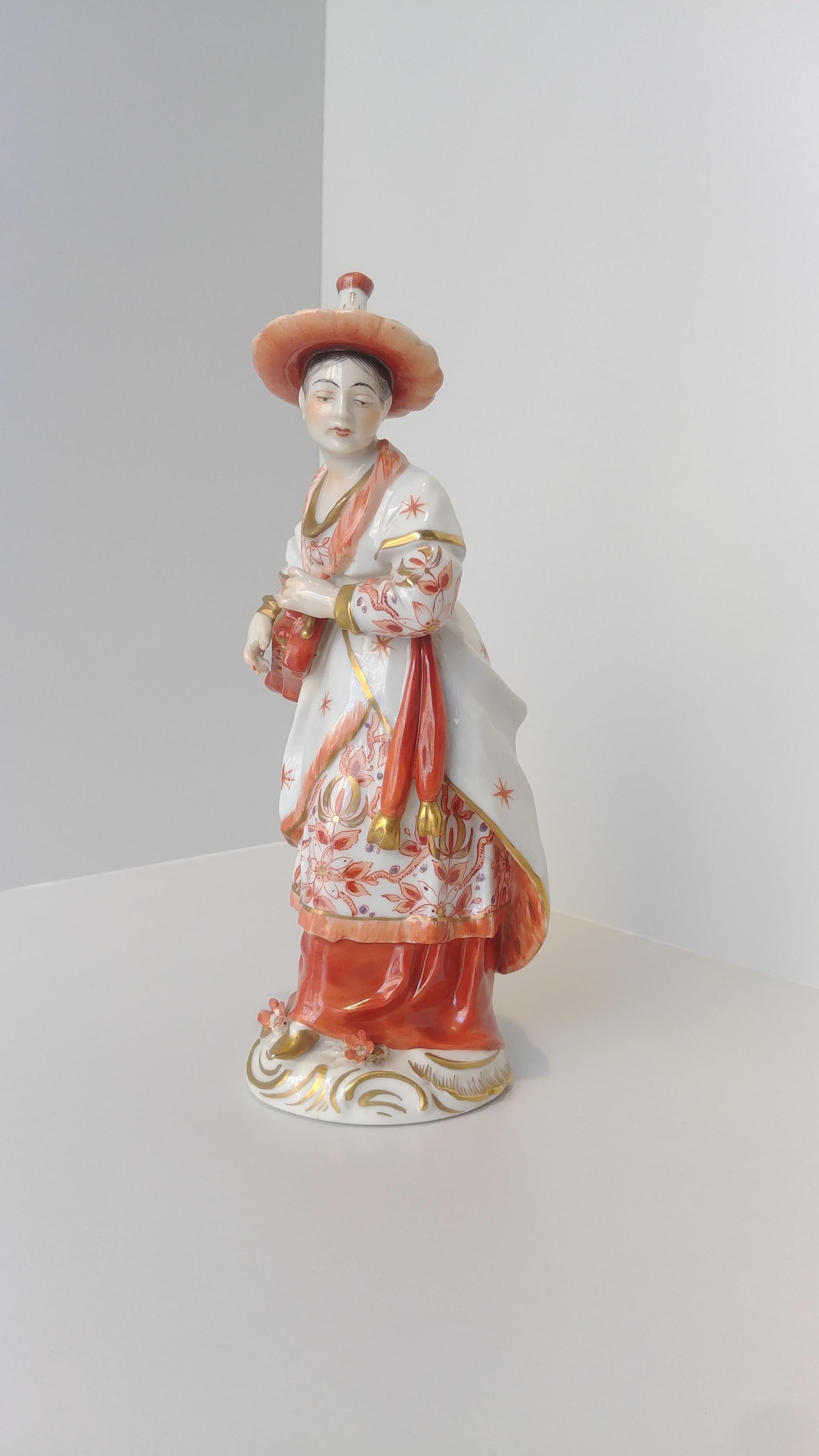 German Pair of Orange Gold Dresden Porcelain Figurines Chinese Musicians, 20th Century For Sale