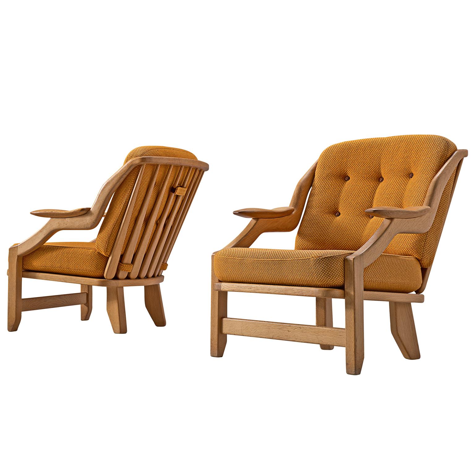 Pair of Orange Guillerme and Chambron Lounge Chairs