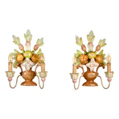 Pair of orange polychrome carved wood sconces from Italy, 1920s