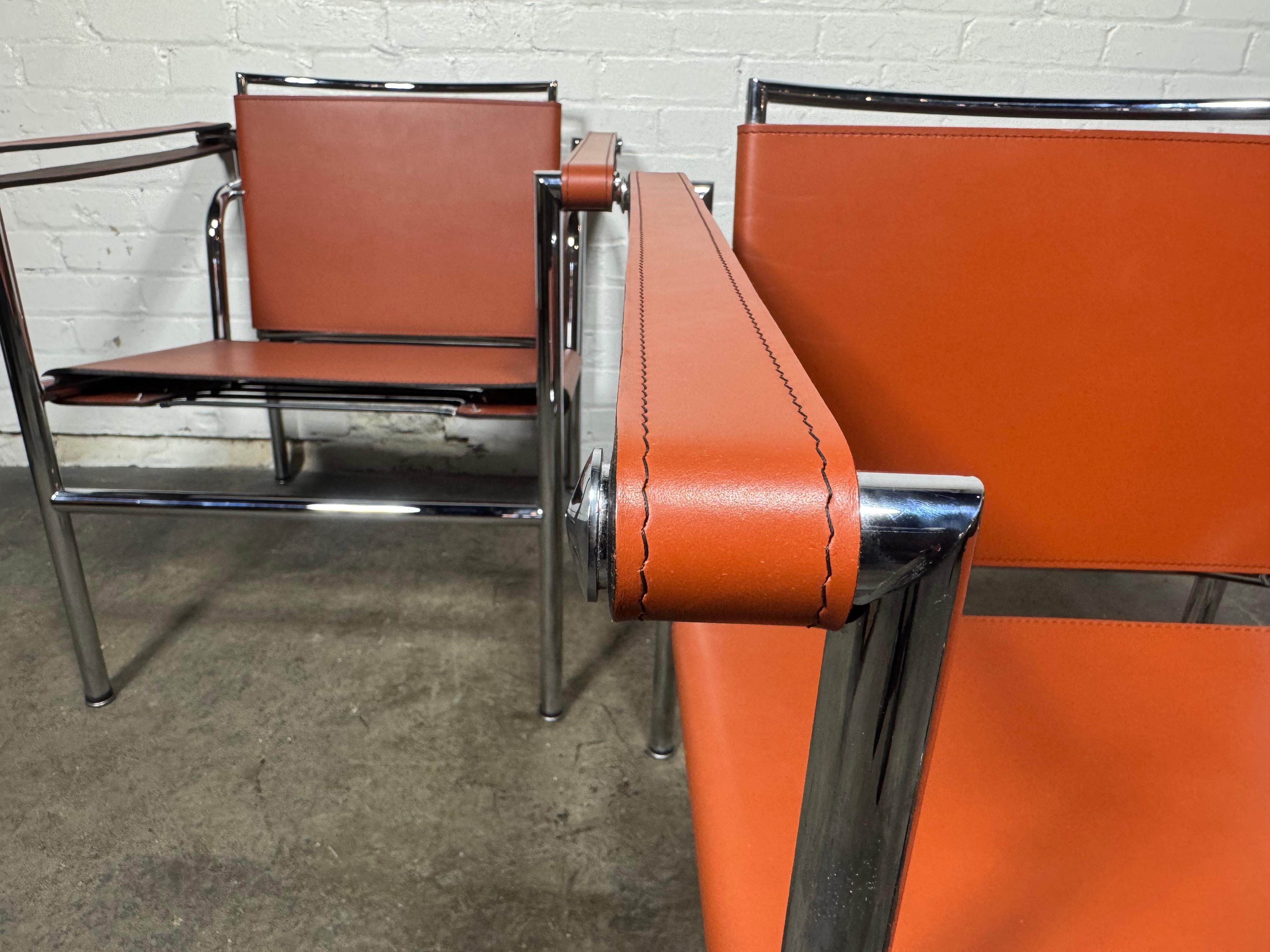 Bauhaus Pair of Orange/Pumpkin Leather Le Corbusier Armchairs LC1 / Design Within Reach
