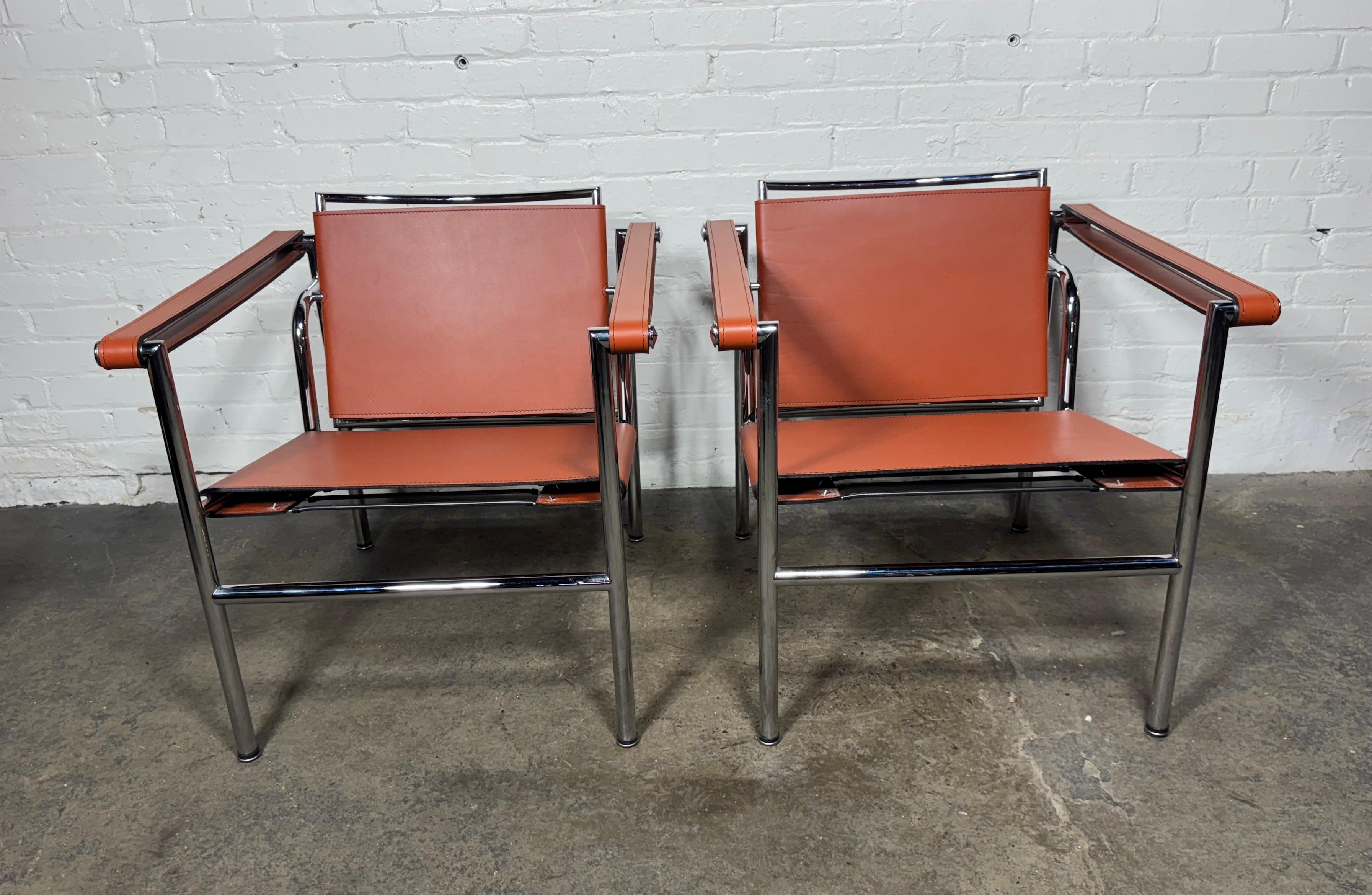 Late 20th Century Pair of Orange/Pumpkin Leather Le Corbusier Armchairs LC1 / Design Within Reach