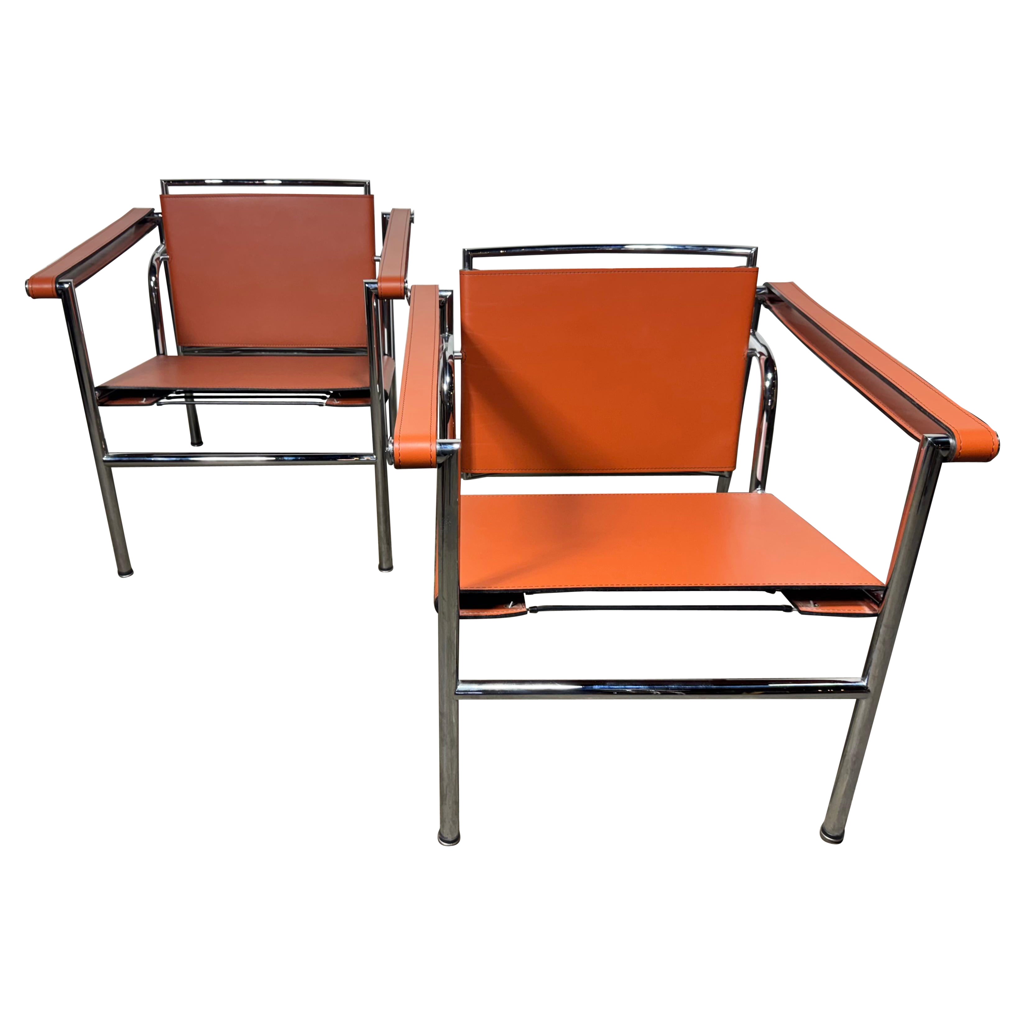 Pair of Orange/Pumpkin Leather Le Corbusier Armchairs LC1 / Design Within Reach