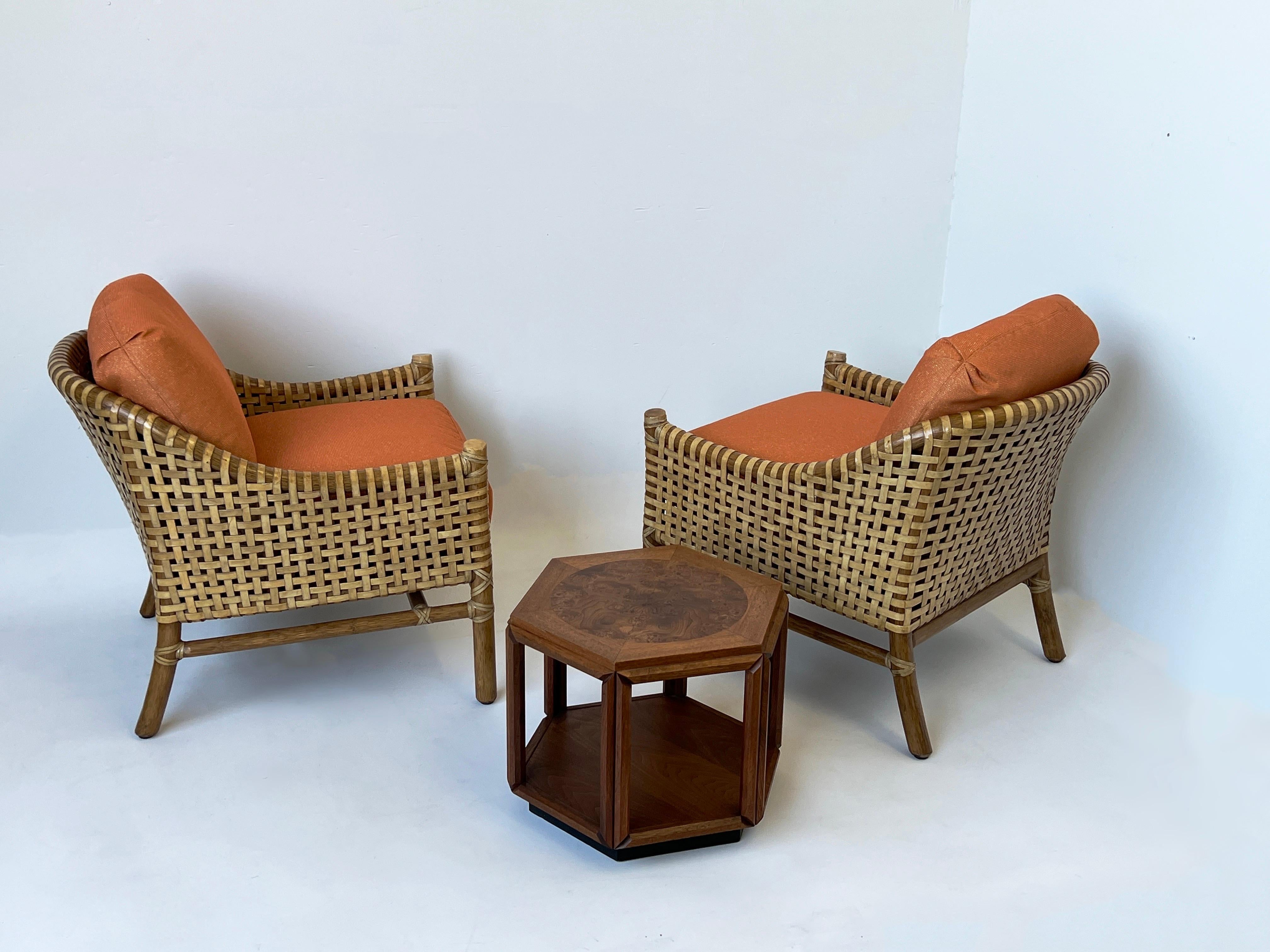 Lacquered Pair of Orange Rattan Bamboo and Rawhide Lounge Chairs by McGuire