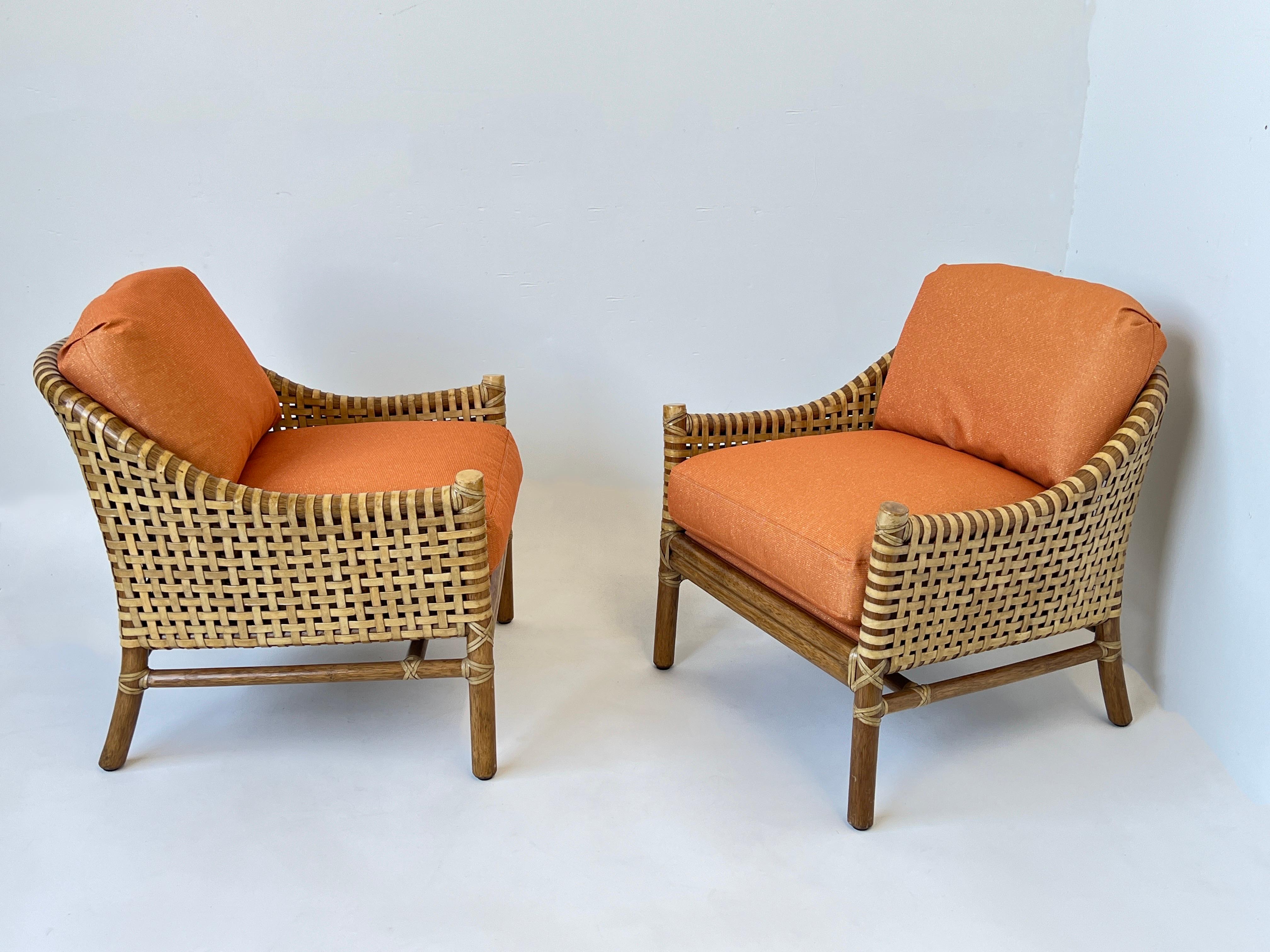 Pair of Orange Rattan Bamboo and Rawhide Lounge Chairs by McGuire 1