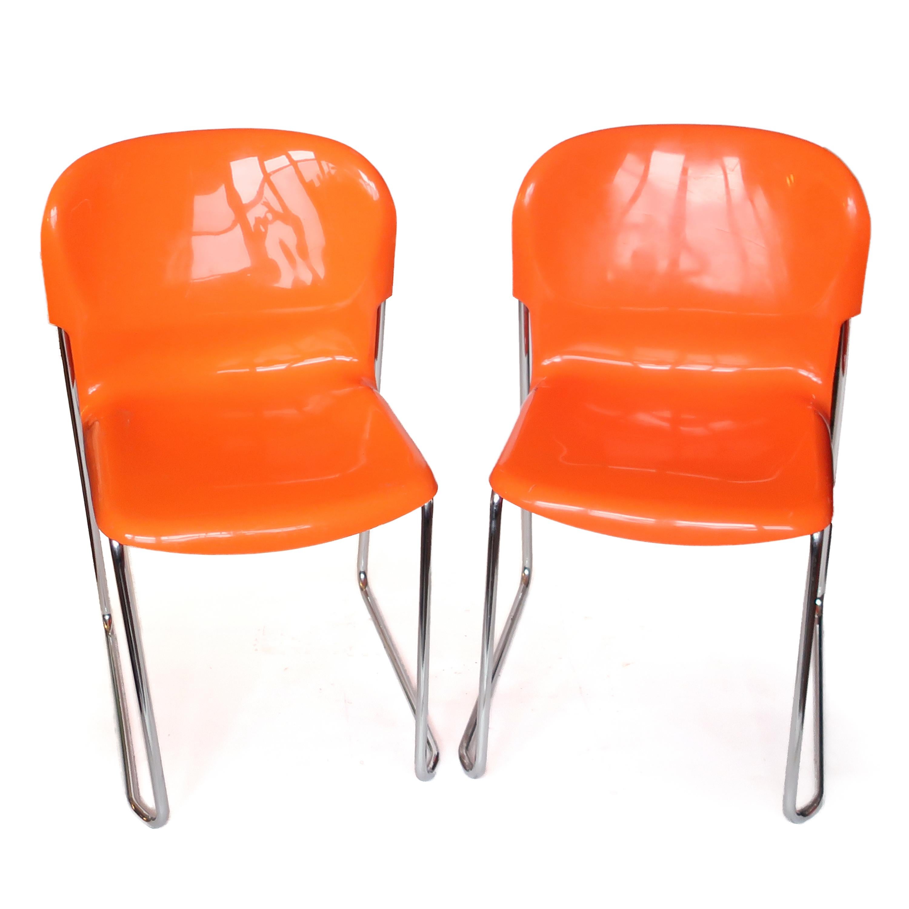 Mid-Century Modern Pair of Orange SM 400 Swing Chairs by Gerd Lange for Drabert For Sale