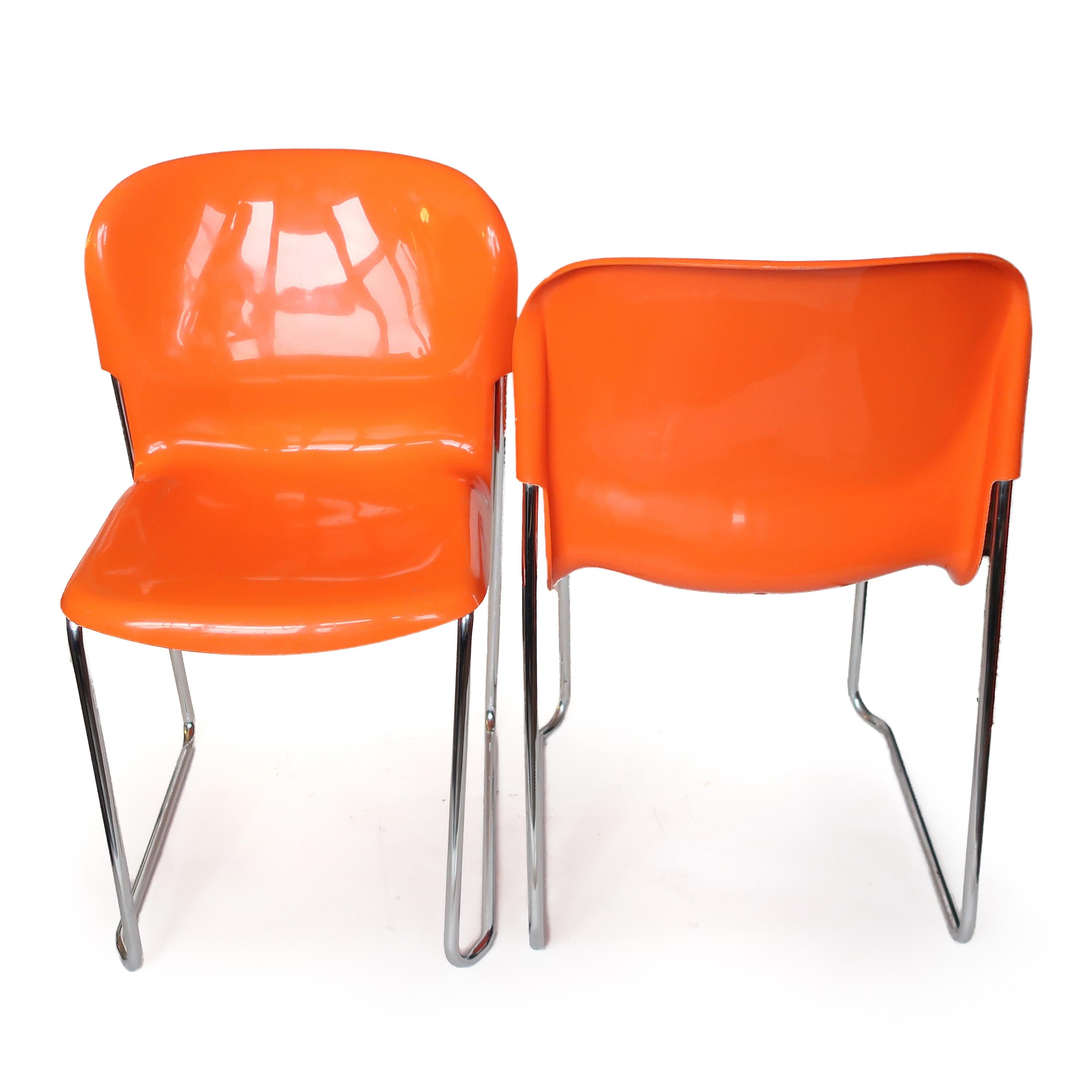 Pair of Orange SM 400 Swing Chairs by Gerd Lange for Drabert In Good Condition For Sale In Brooklyn, NY