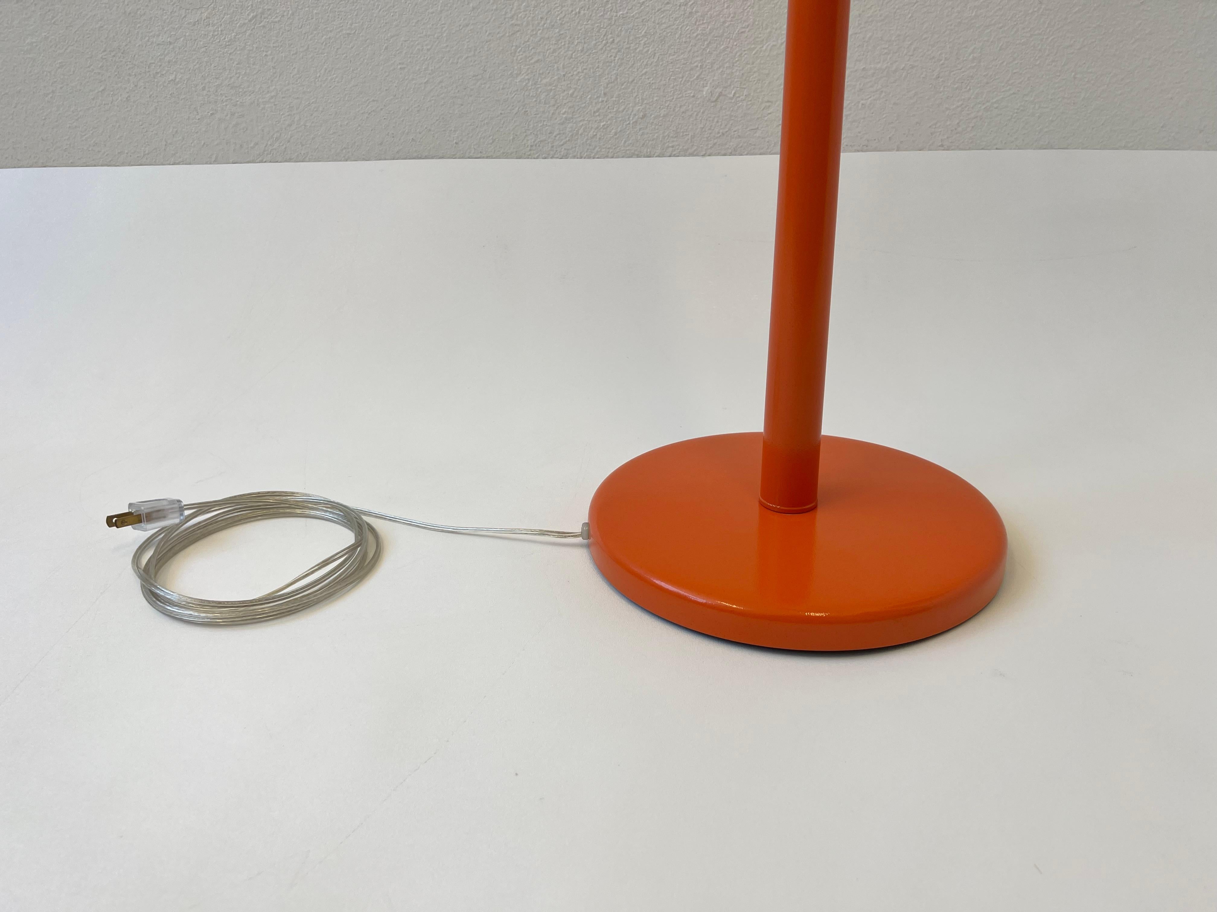 Metal Pair of Orange Torchiere Floor Lamps by Walter Von Nessen