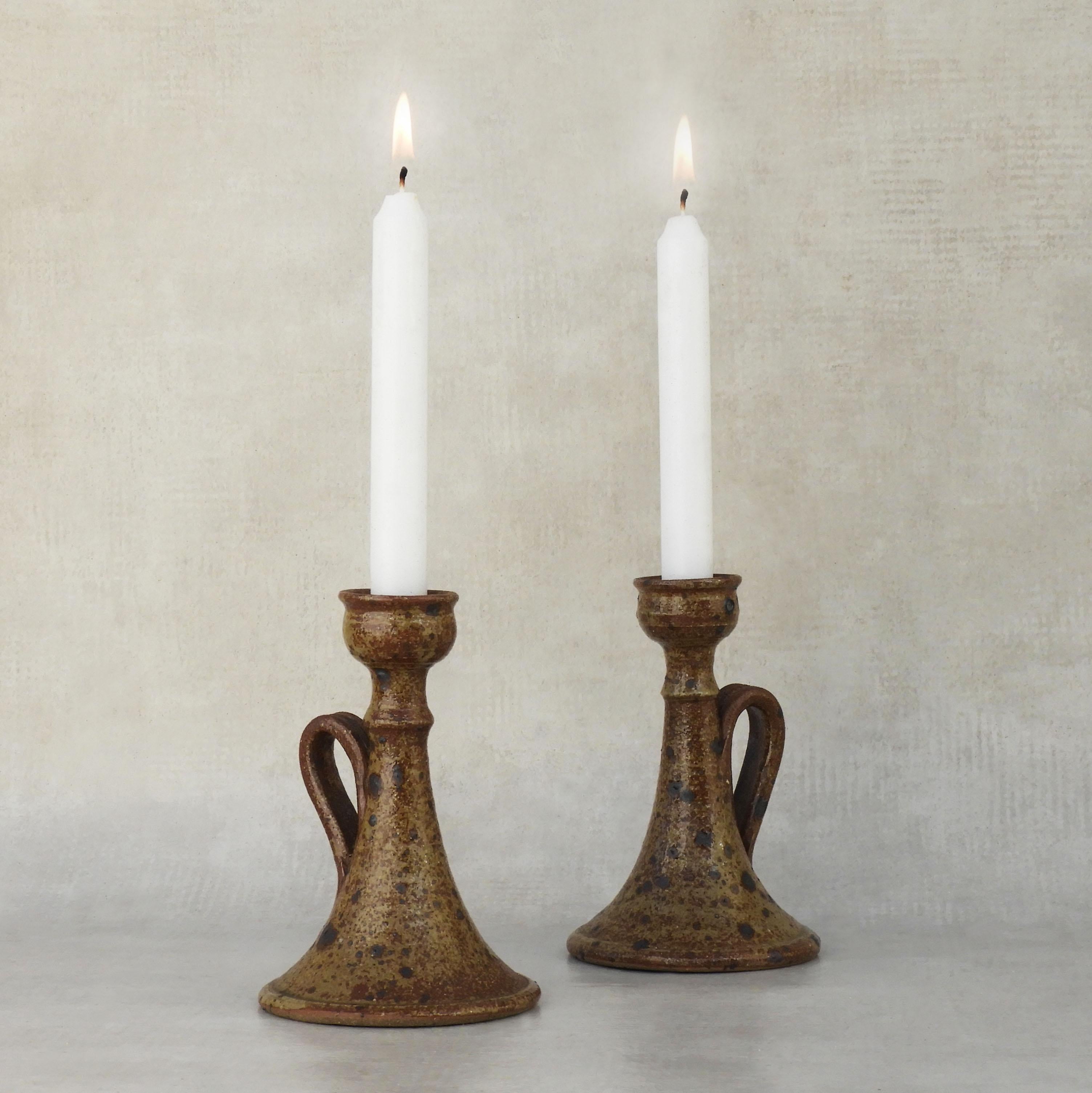 Pair of Organic Stoneware Candle Holders 1960s French Studio Pottery
An attractive pair of studio pottery candle holders in ‘Grès Pyrité’ from 1960s France. Two handcrafted ceramic candlesticks with a beautiful organic iron pirate finish. Beautiful