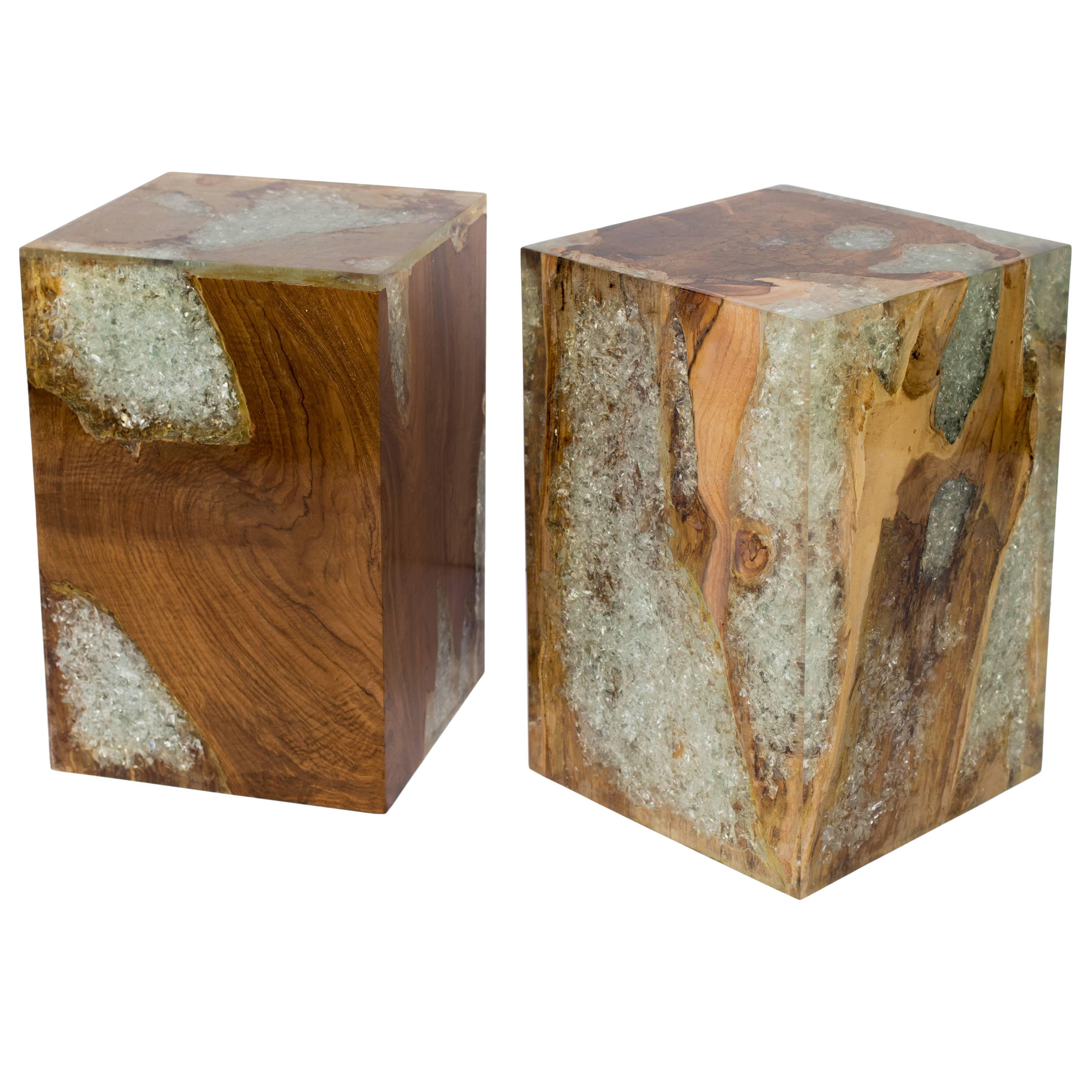 Pair of Organic Modern side tables in natural and bleached reclaimed teak root wood infused with cracked resin. Polished finish with unique wood variations on all sides. Handcrafted in Indonesia for multi-purpose use. Some variation in colors may be