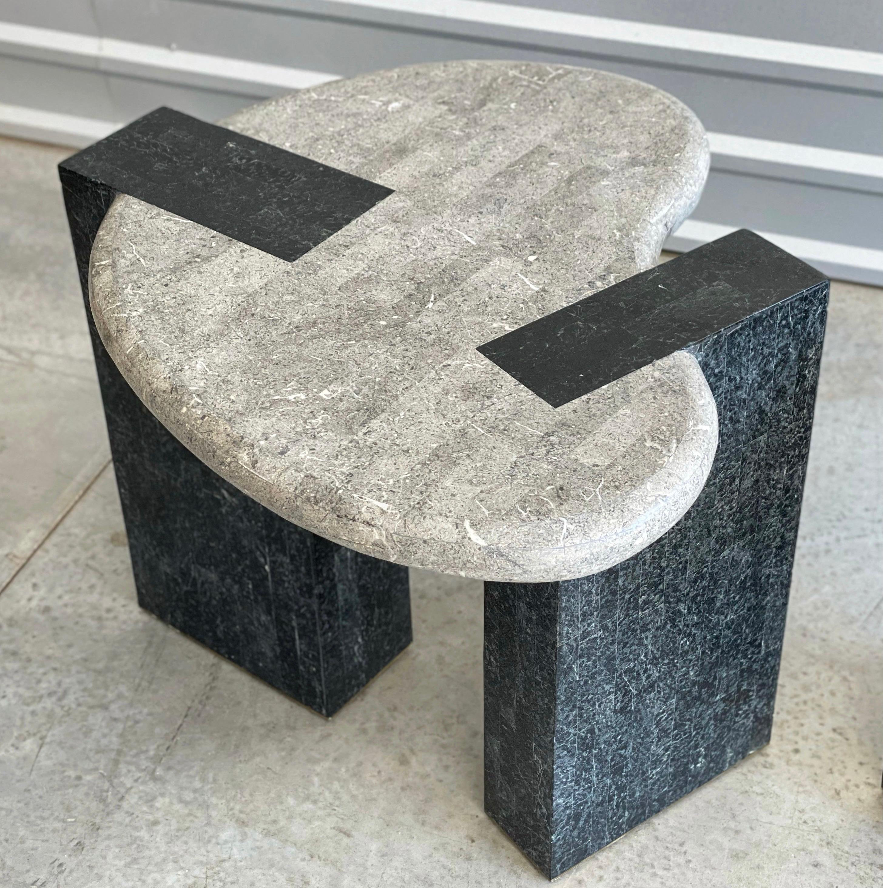 Striking pair of midcentury deco style tessellated stone side tables by Maitland-Smith. Biomorphic amoeba kidney shaped tops juxtaposed with rigid angular rectangle legs. Shades of gray and black throughout. Excellent unaltered condition.
Each