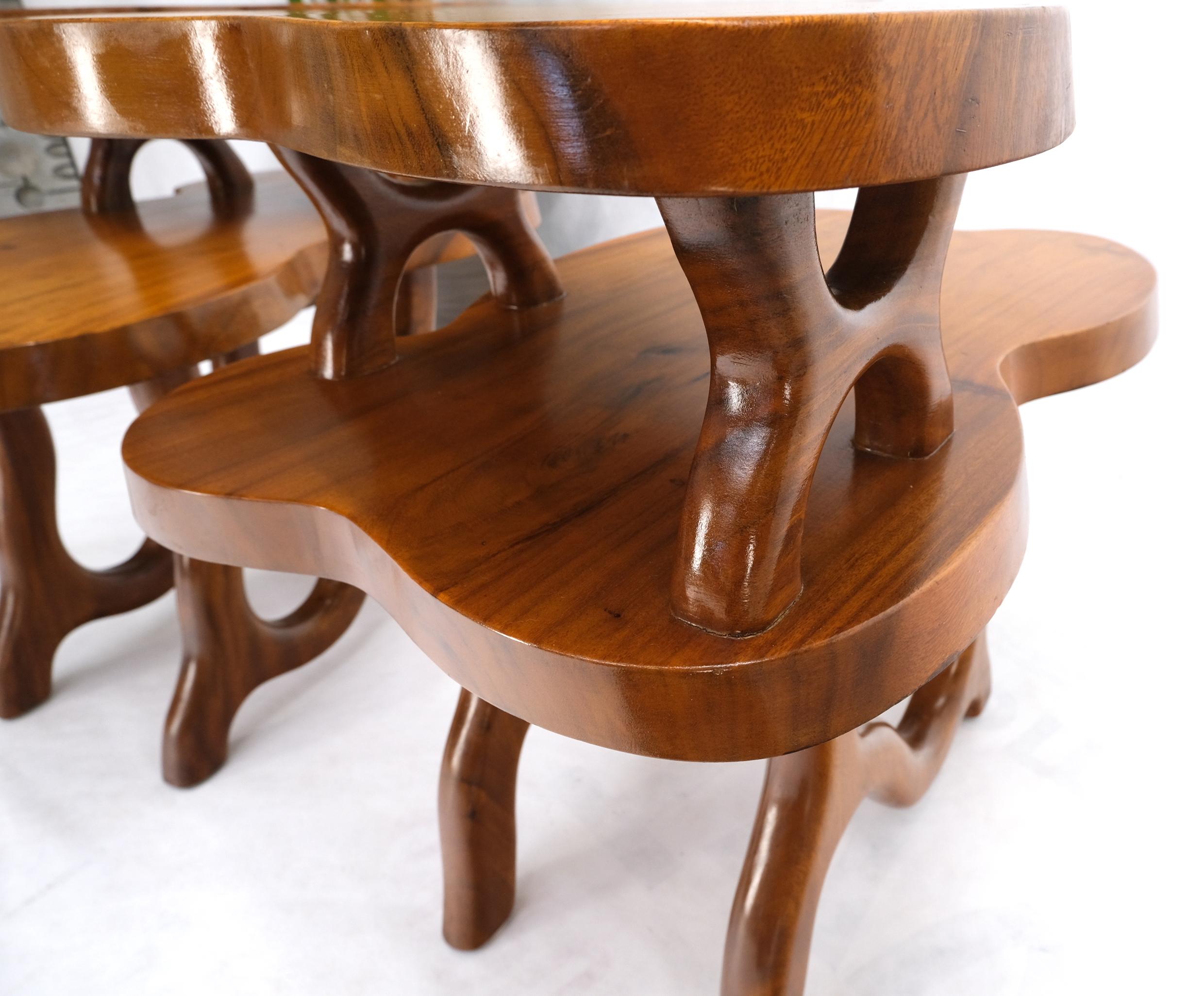 Pair of Mid-Century Modern thick solid wood unusual organic shape side step tables.