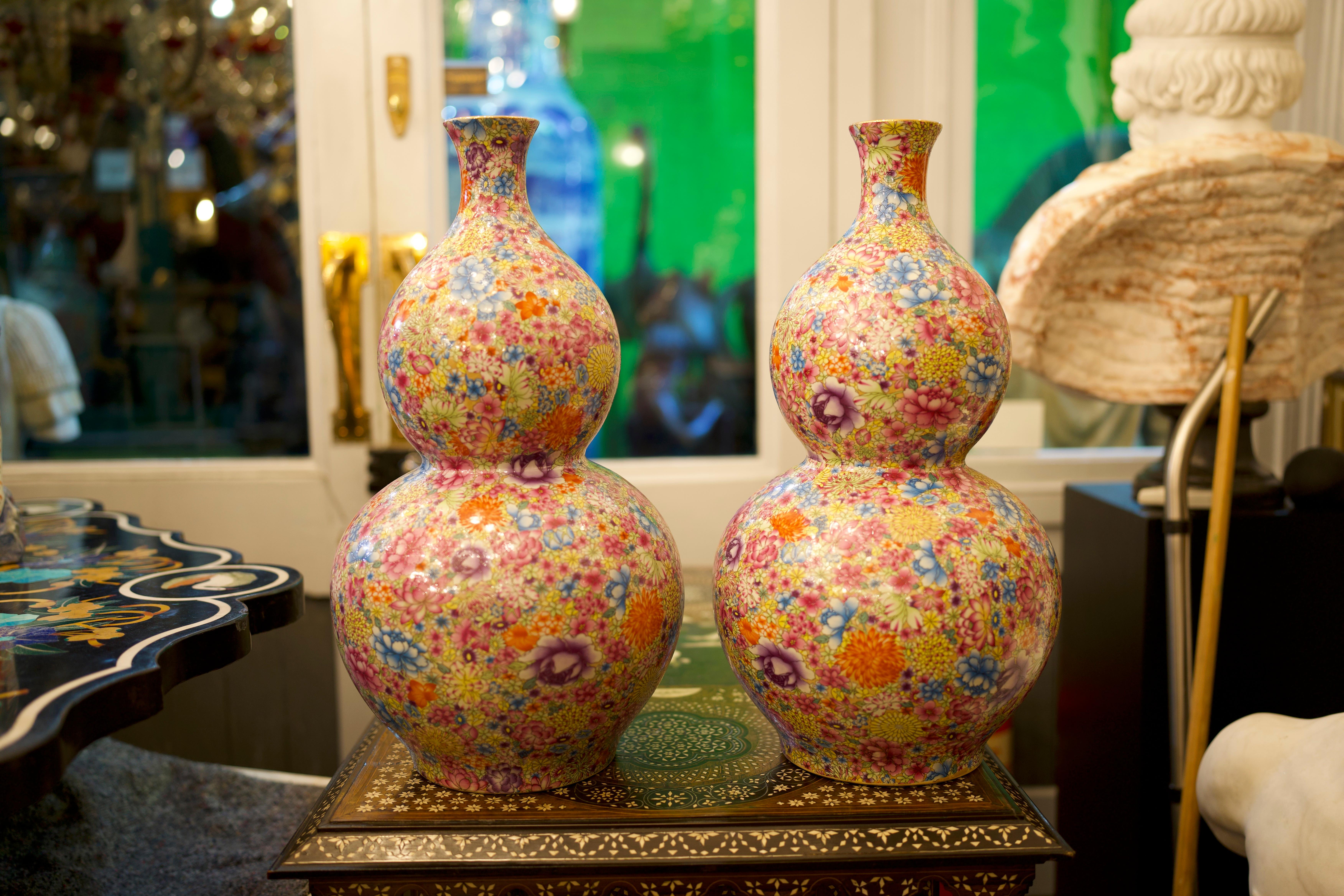 A unique Pair of Oriental Double-Gourd Mille-Fleur vases, 20th Century. Very beautiful in shape and design and fantastic for home decoration.