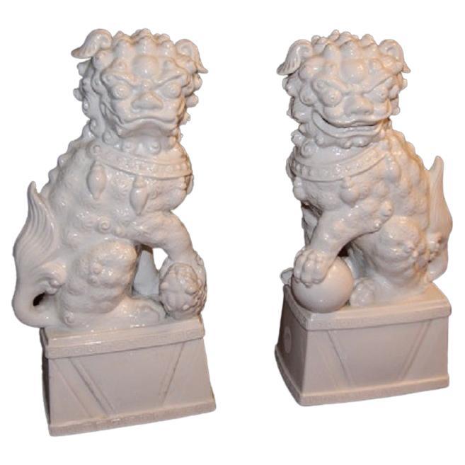 Pair of Oriental Porcelain Sculptures Pair of Foo Dogs from the 1800s