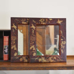 Pair of Oriental red lacquer mirrors