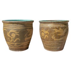 Pair of Oriental Style Ochre Colored Pots with Dragon Decoration