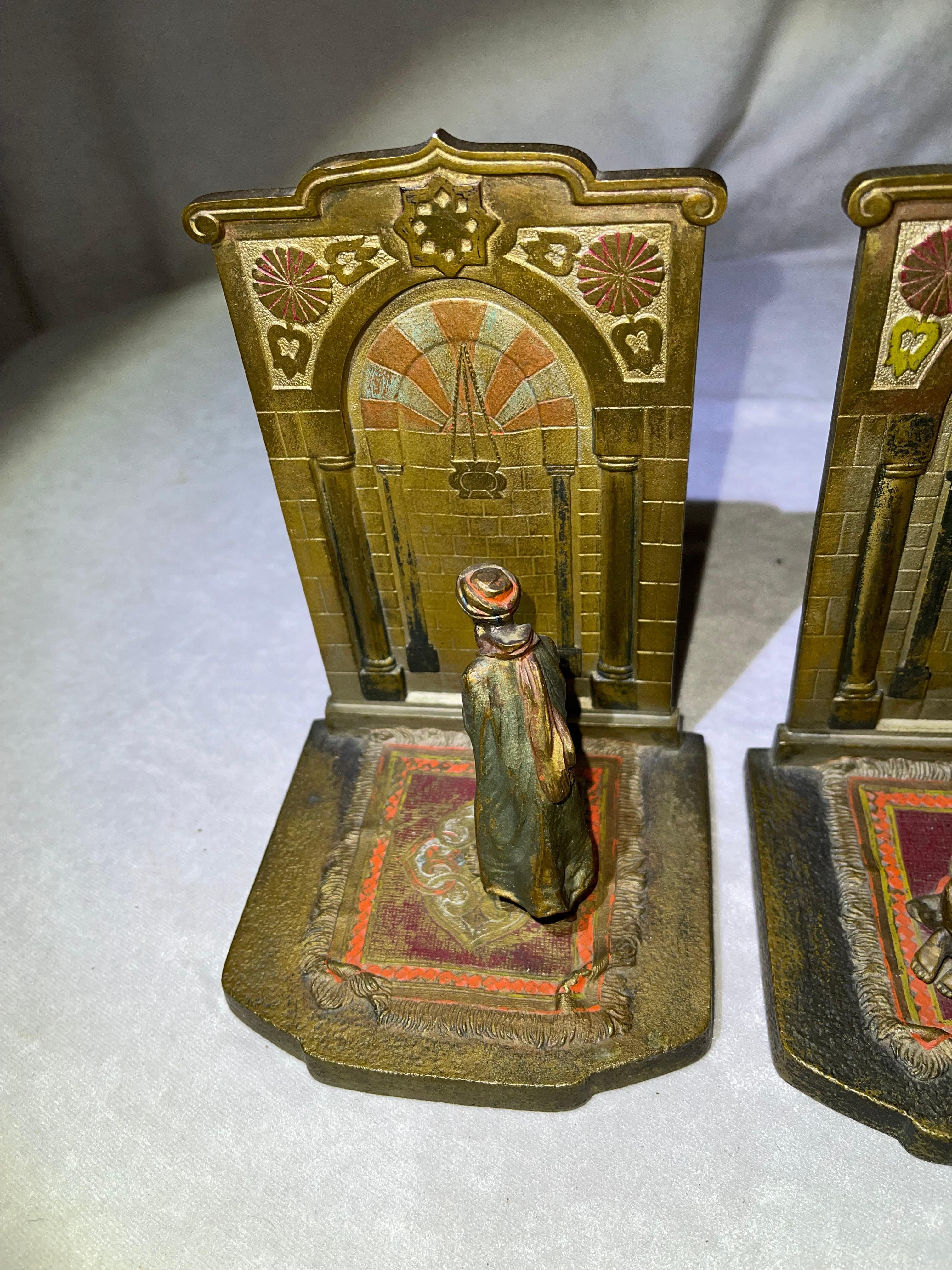 These highly detailed bronze bookends are a fine example of cold painted Vienna bronze workmanship. Brightly colored and crisp casting is often the work by the artist 