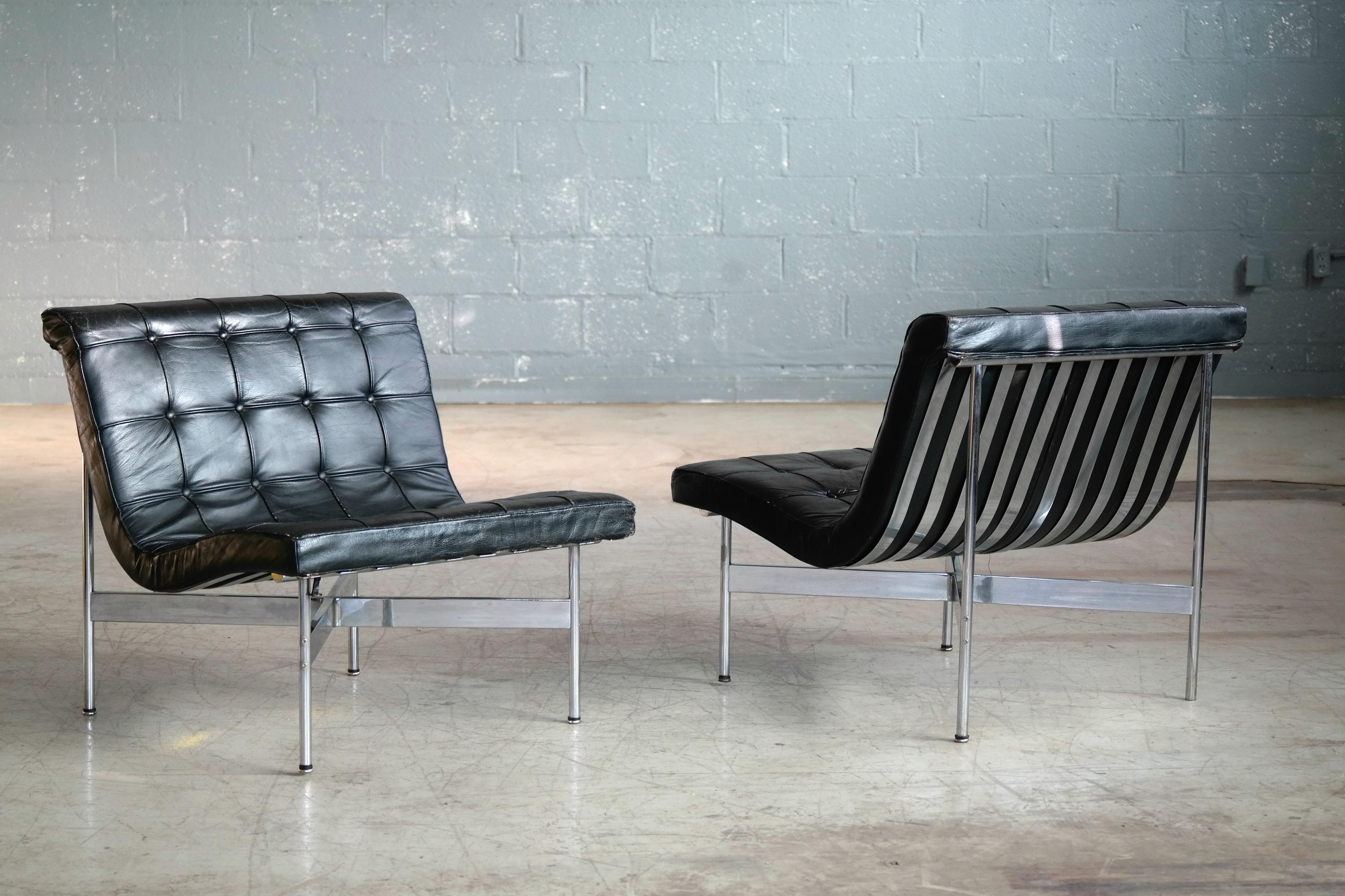 A rare and fantastic pair of original lounge chairs designed by William Katavolos, Ross Littell and Douglas Kelley for Laverne International from the Architectural Group One line in 1952. The design of the steel frame creates a fantastic open look