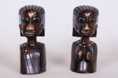 Coppia di fermalibri africani originali, in ebano laccato, in ottimo stato di conservazione, anni '20