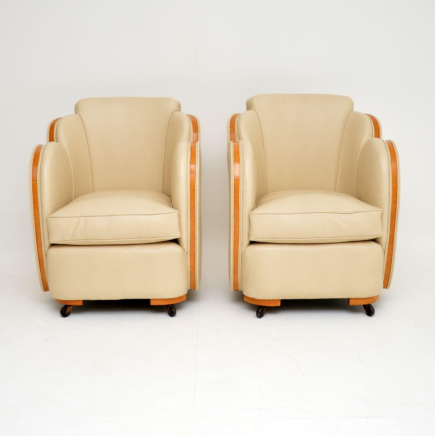 A stunning and very rare pair of vintage Art Deco period cloud back armchairs. These were made by Harry & Lou Epstein, they date from the 1920-30’s. They have beautiful burr maple banding all around the frames, up the arms, across the backs and on