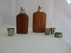 Pair of original Aubock leather wraped Hip Flasks
