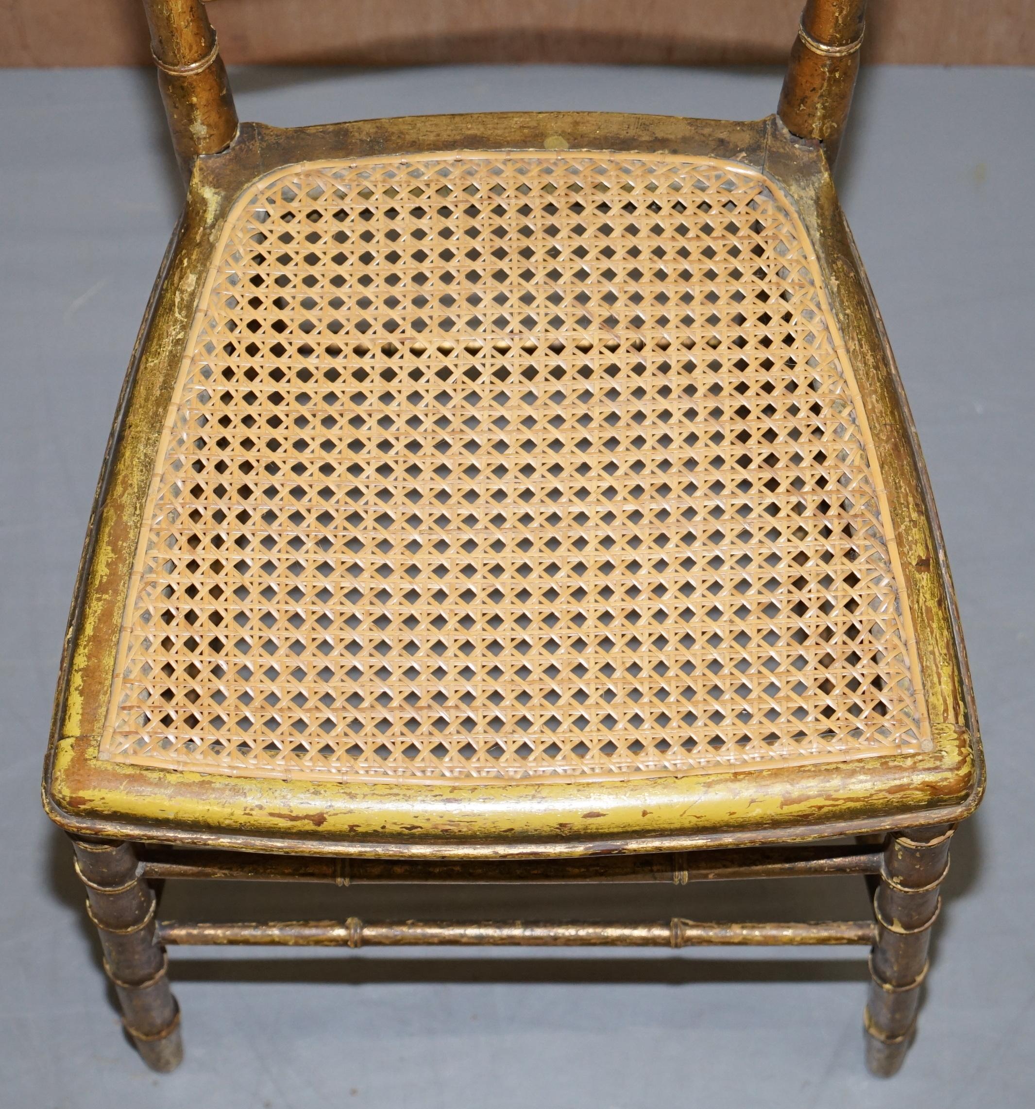 Early 19th Century Pair of Original Giltwood Famboo Regency Bergere Chairs with Period Gold Gilding For Sale