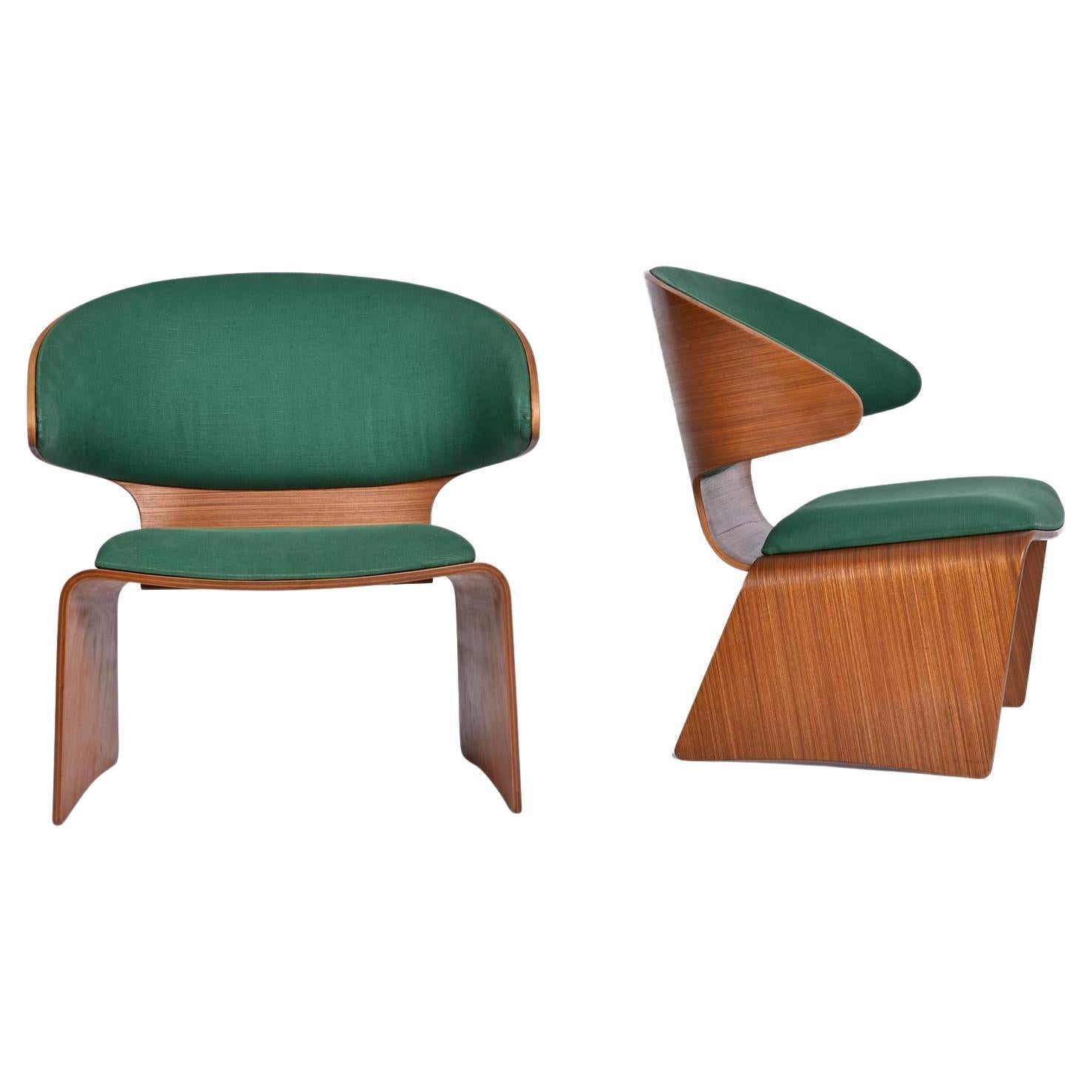 Not only are these Hans Olsen Bikini chairs in beautiful condition, but they proudly sport their original green fabric. We took these chairs into our shop for a full detailing and only had to make very minor touch-ups. The glass-smooth multiplex