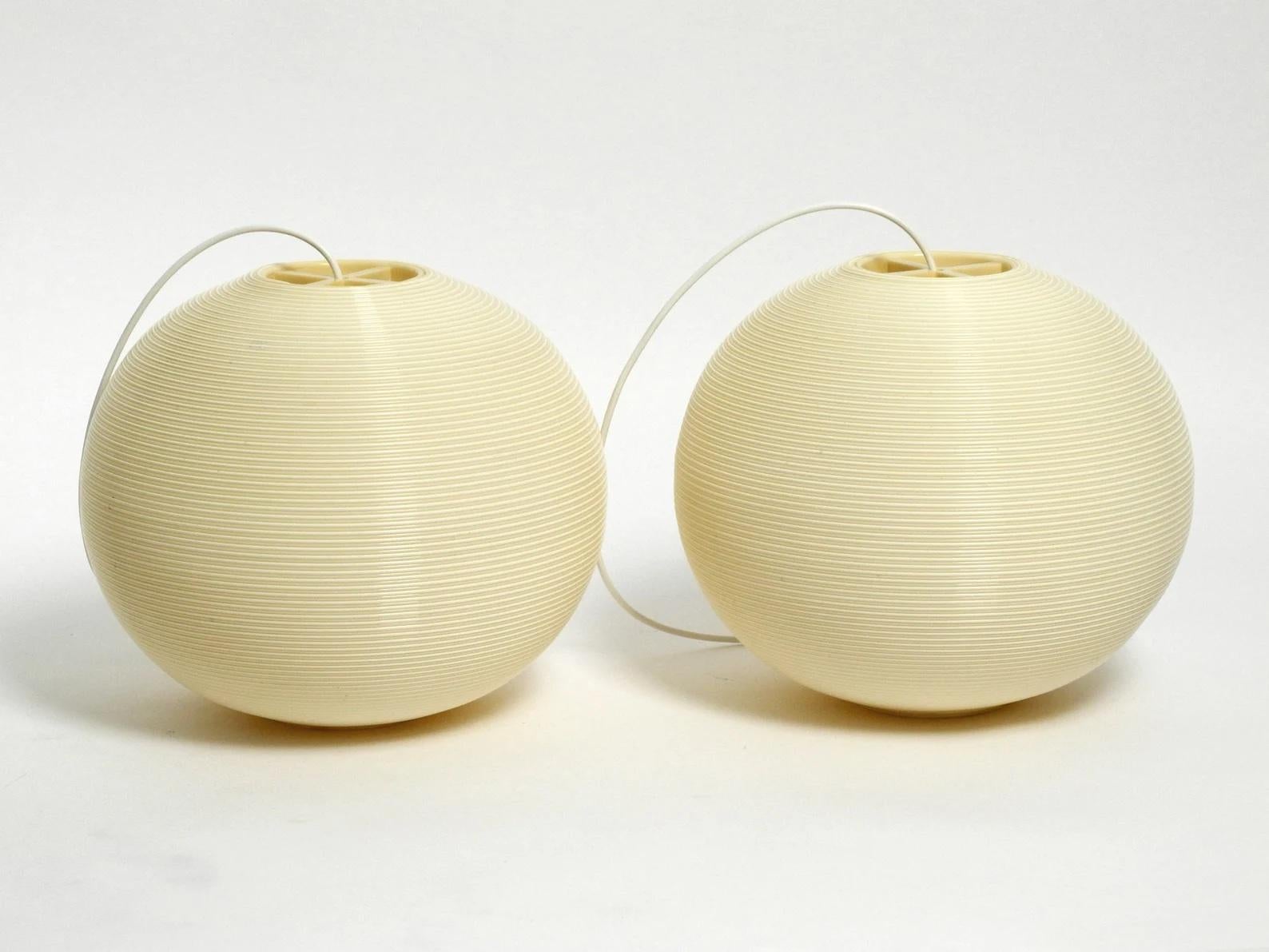 Pair of large original 1960s beige Heifetz Rotaflex pendant lamps. 
Great glare-free light for all living spaces. Very good original condition without damage. 
With original suspension and socket.
One E27 socket for enough light in each