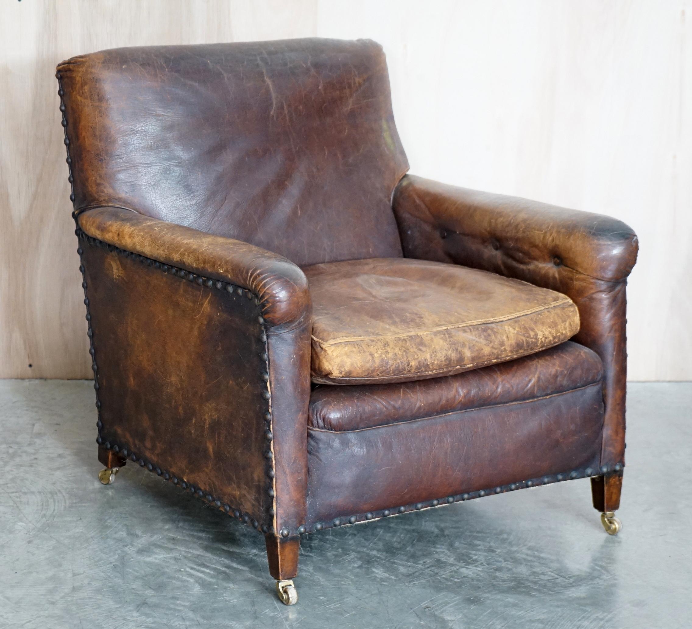 We are delighted to offer for sale this super comfortable pair of original leather, Victorian club armchairs with coil sprung bases, feather filled cushions and Thomas Chippendale style floating buttons on the arms.

These are a very well made and