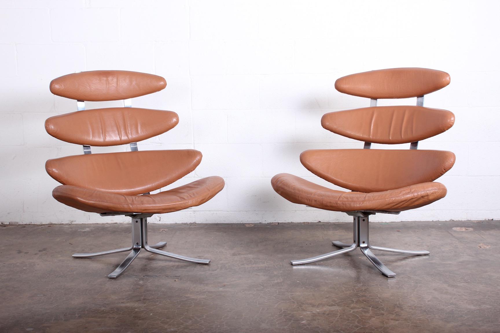 A pair of swiveling Corona chairs by Paul Volther for Erik Jørgensen in original leather.