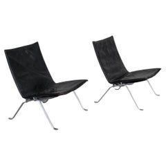 Paire de chaises longues originales en cuir Poul Kjaerholm PK22 du milieu du siècle dernier