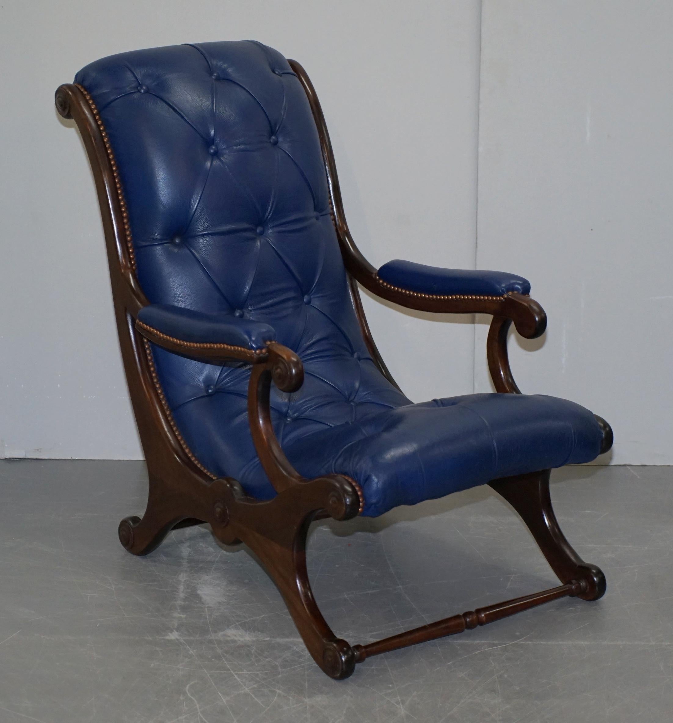 We are delighted to this lovely set of original Victorian Napoleonic royal blue chesterfield library, slipper, reading armchairs

A very good looking and well-made pair. These are the originals made in the late Victorian era not the modern “in