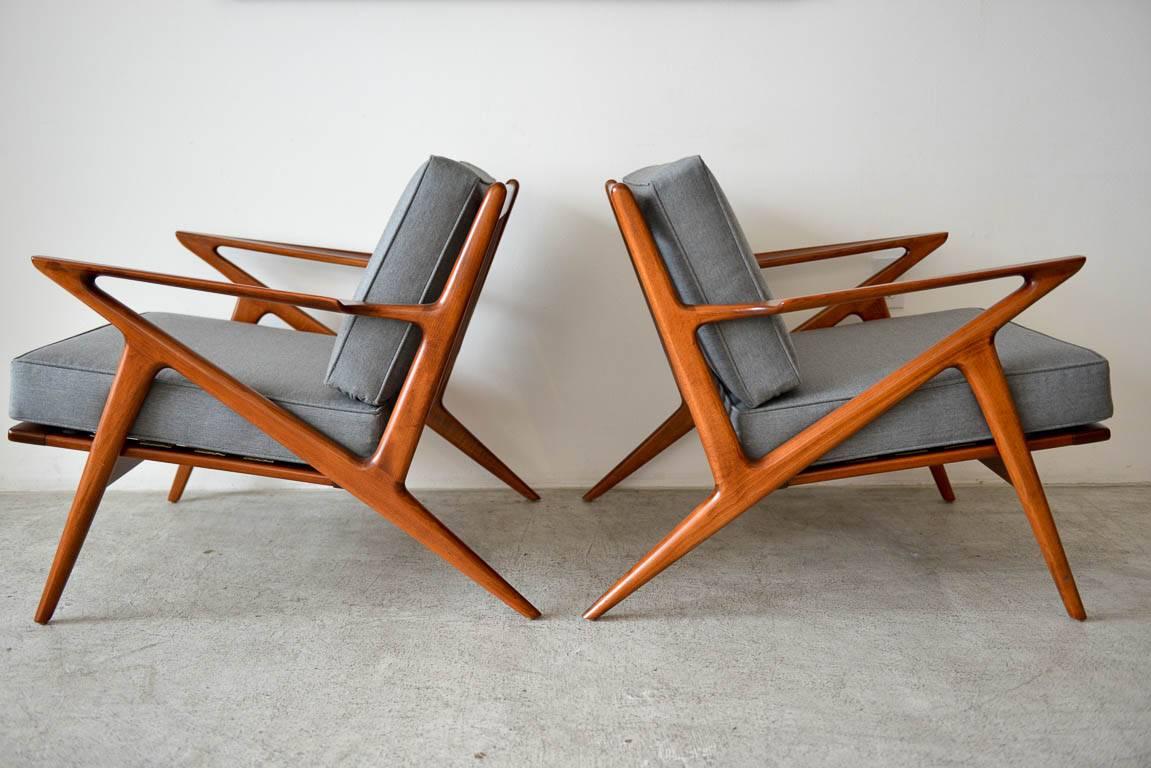 Pair of original Poul Jensen 'Z' chairs by Selig, circa 1960. Fully restored in showroom condition with beautiful tailored grey cushions. Classic and iconic style, beautiful quality and timeless design. Both with original Selig emblems on frame, new