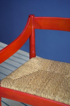 Pareja de originales sillones de carimato rojo de Vico Magistretti