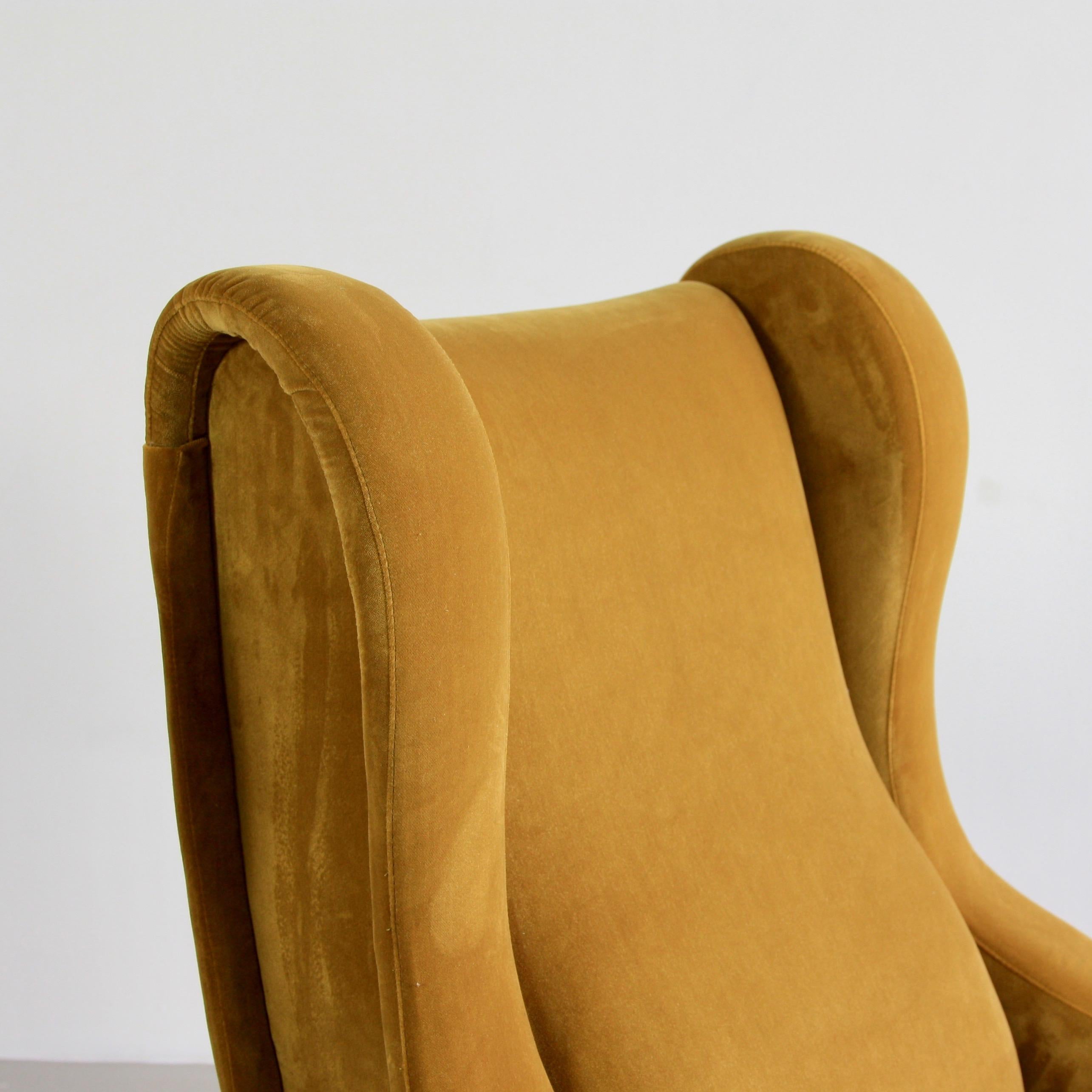 Pair of Senior chairs, designed by Marco Zanuso. Italy, Arflex, 1951.

An early original pair of lounge chairs 'Senior' newly restored and upholstered in mustard yellow coloured velvet material. Metal frame with brass legs fittings and wooden