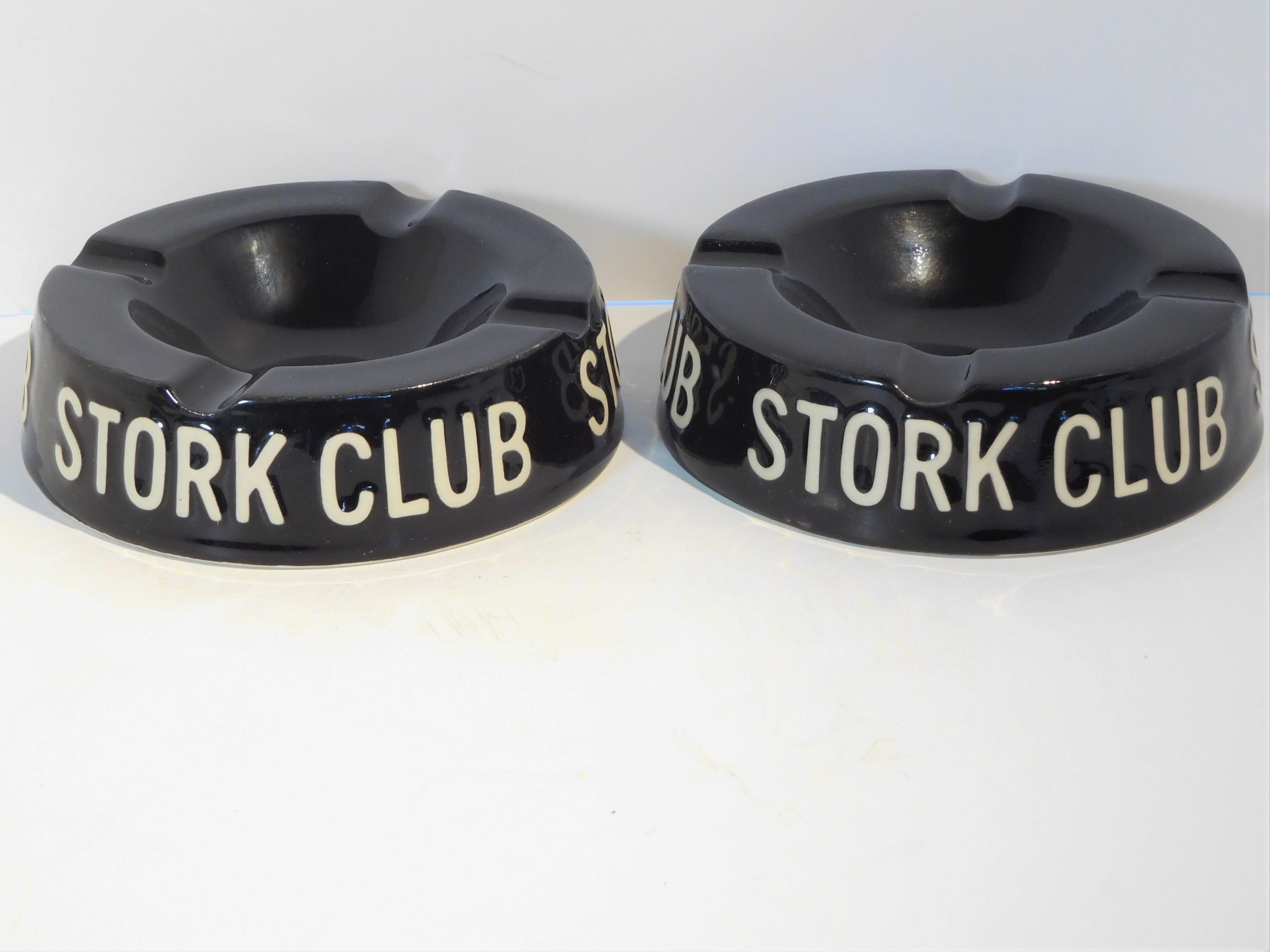 These two ashtrays are from tables at the Stork Club, the iconic night spot on 3 East 53rd Street, New York, New York (1934-1965), operated by Sherman Billingsley. Who often gave away free gifts to his clients. The ashtrays are made of molded black