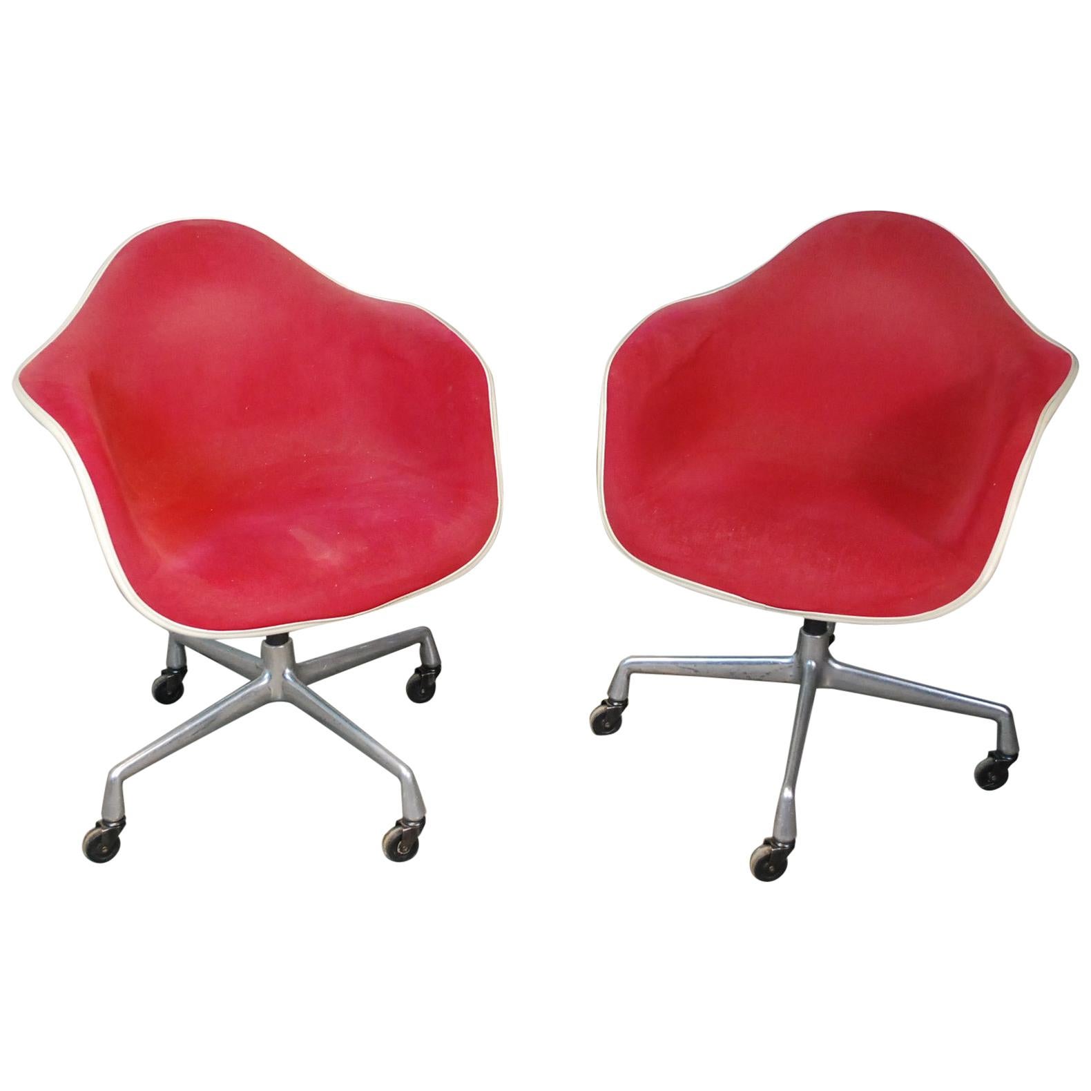 Pair of Original Tagged Molded Swiveling Eames Chairs by Herman Miller