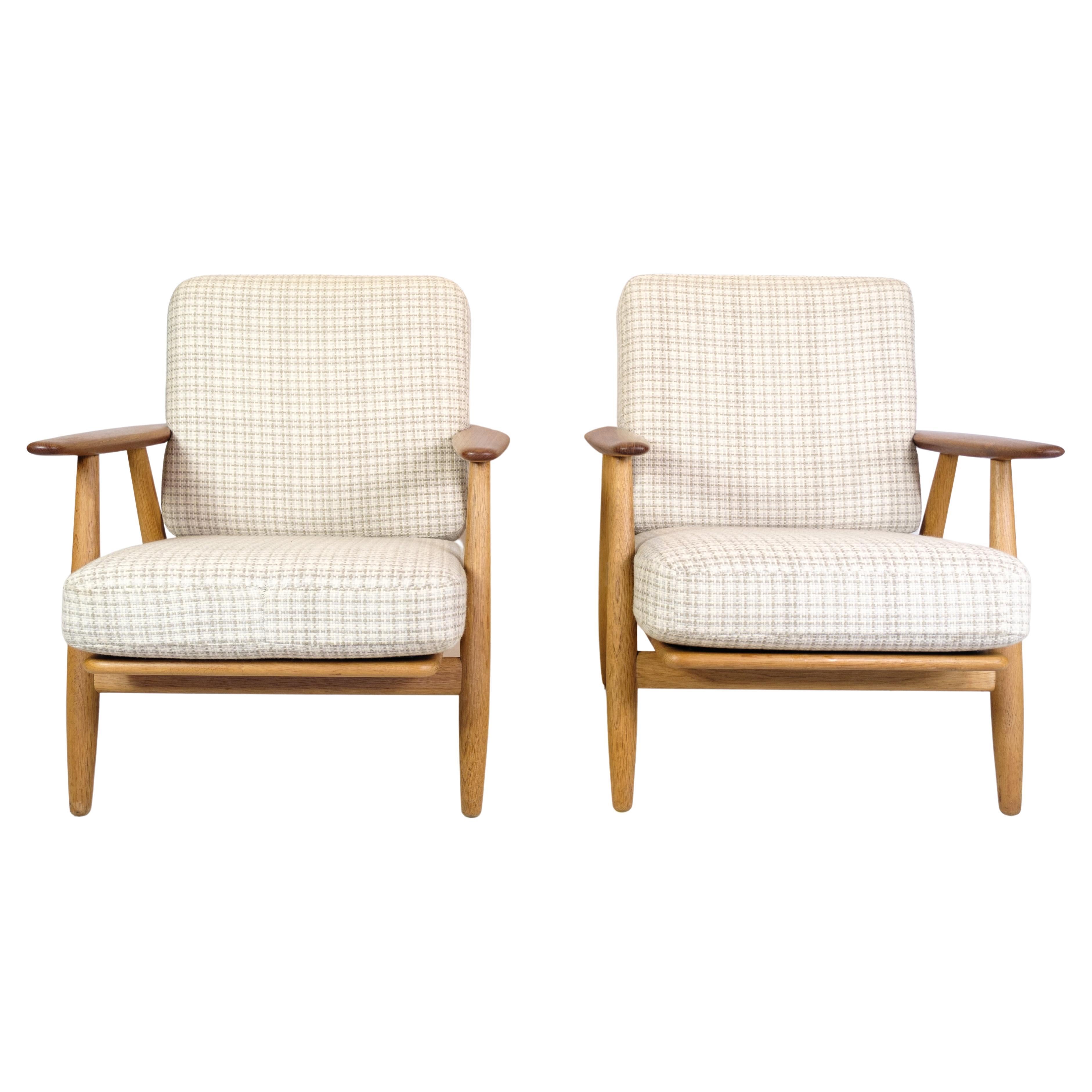 Pair of Original Teak and Oak Cigar Lounge Chairs by Hans J. Wegner for GETAMA