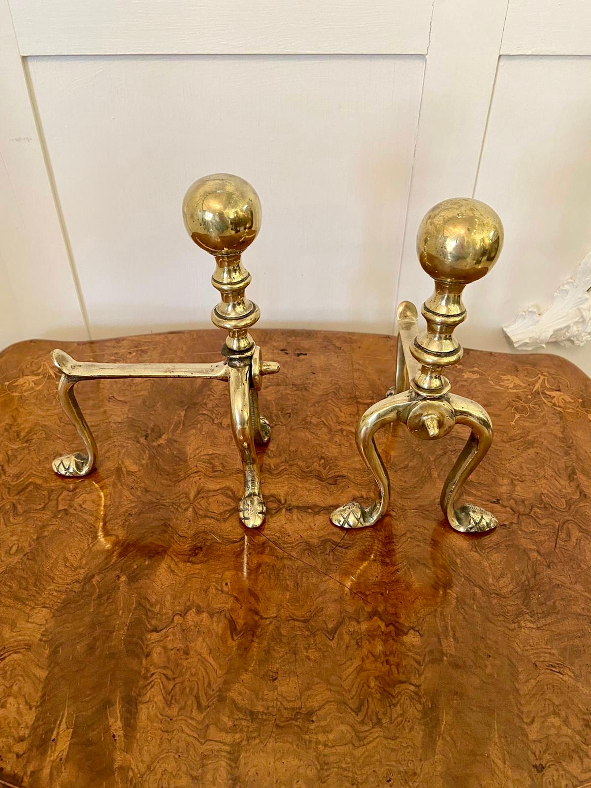 Pair of Victorian brass fire dogs with round ball top, turned shaped column standing on outswept legs

In lovely original condition.

Measures: H 23cm
W 12cm
D 16.5cm.

  