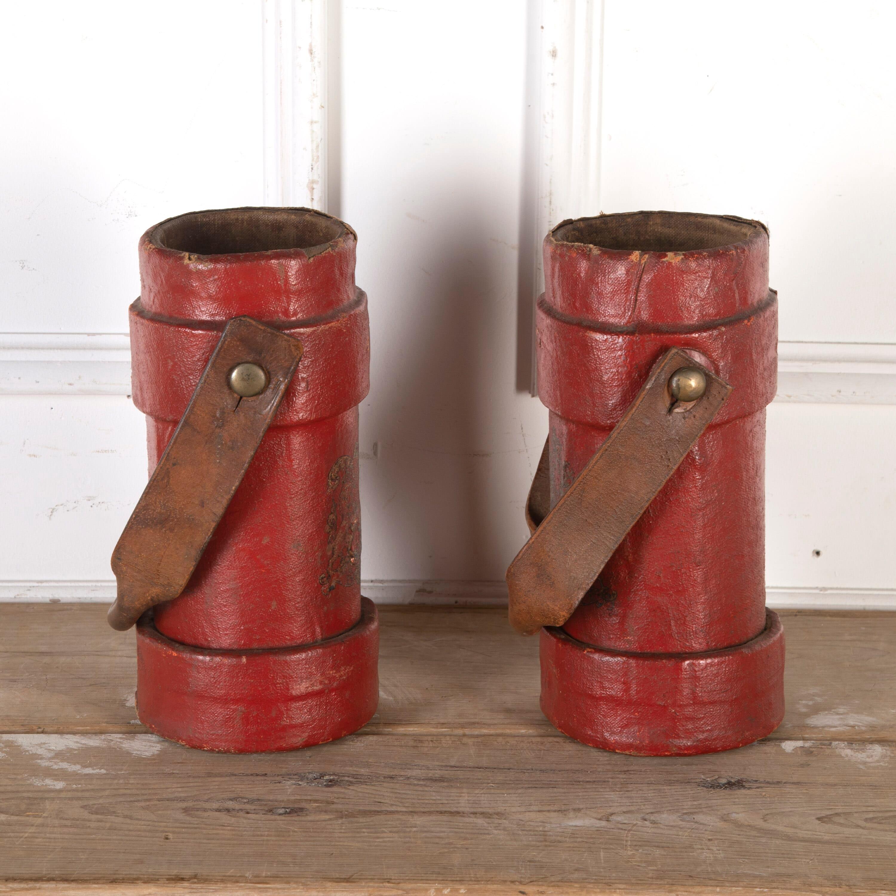 Pair of original red leather military cordite carrier cases, circa 1900. 

These objects are increasingly rare. They were used by the military prior as well as during WW1. These cases are made from leather and cork canvas and retain their original