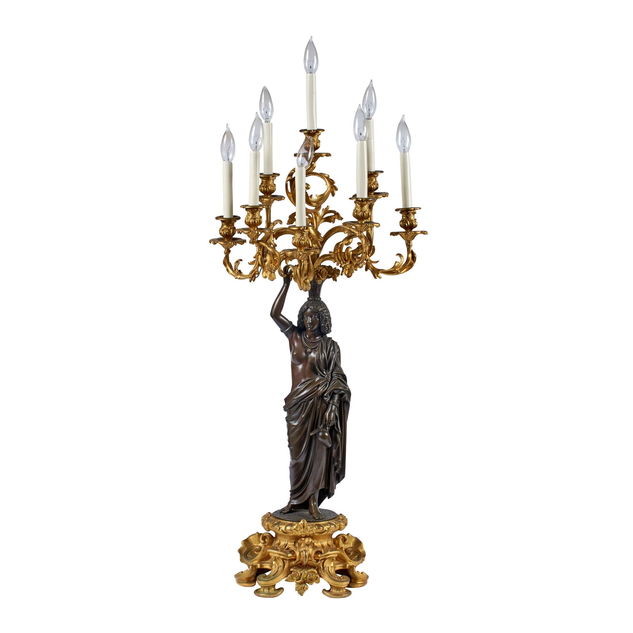 Rococo Pair of Ormolu and Patinated Bronze Figural Eight-Light Candelabras For Sale